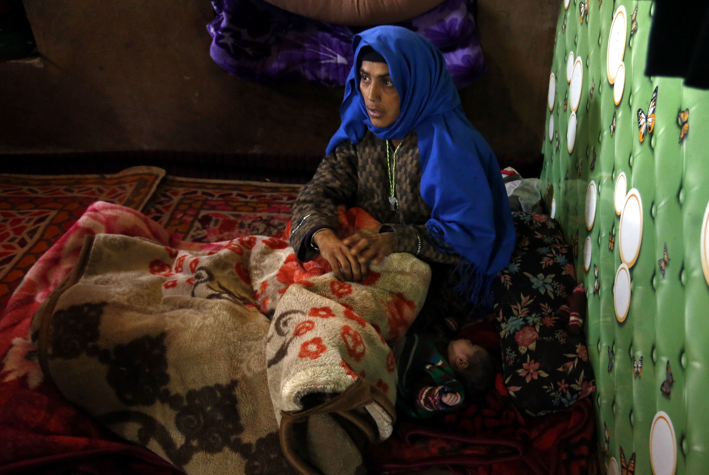 Akhtar Jan at her home in Zirkan village in Indian-administered Kashmir&#39;s Shopian district [Shuaib Bashir/Al Jazeera]