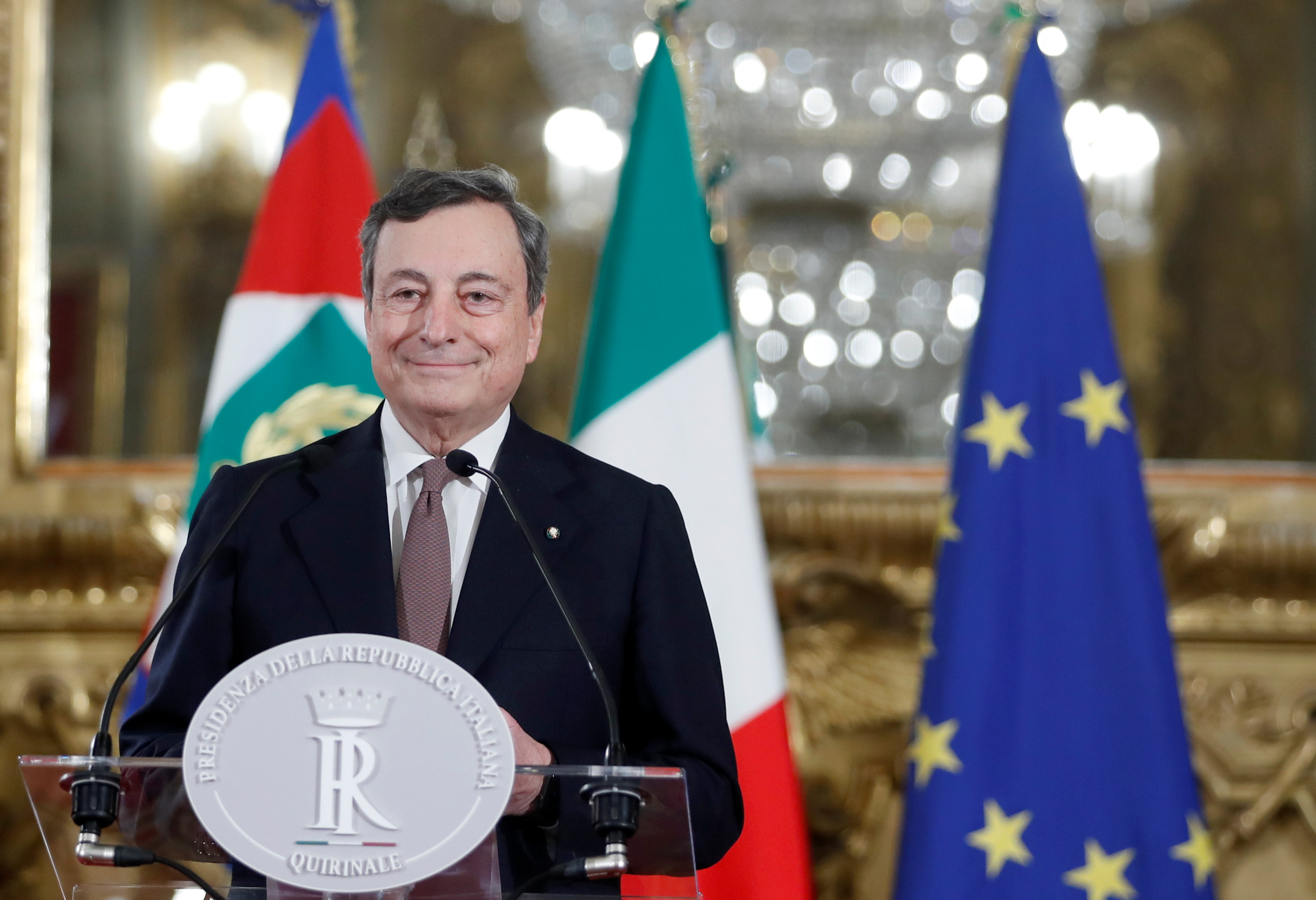 Italy&#39;s new Prime Minister Mario Draghi speaks to the media after meeting with Italian President Sergio Mattarella, in Rome, Italy, February 12, 2021 [Yara Nardi/Reuters]