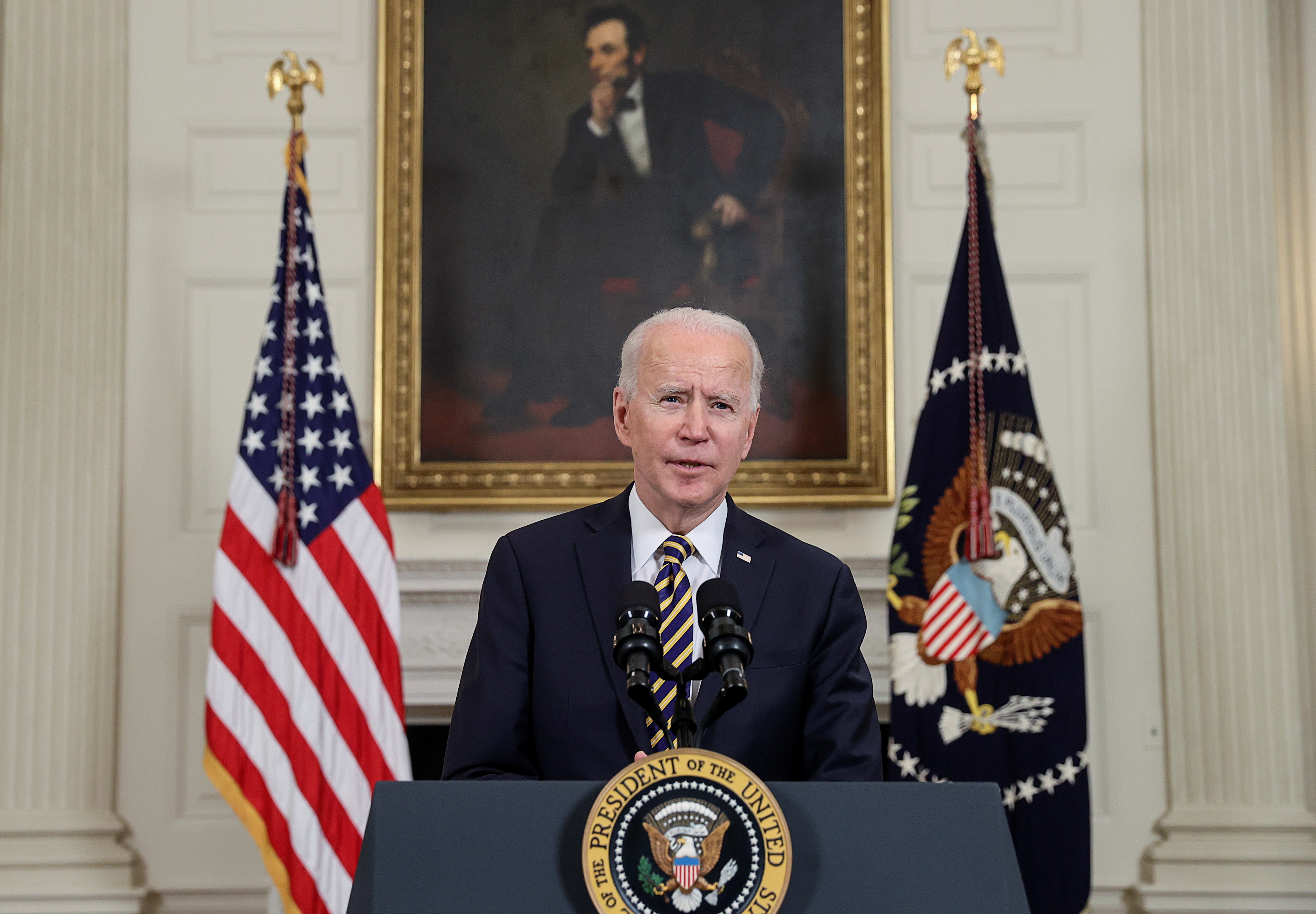United States President Joe Biden delivers remarks prior to signing an economic executive order on February 24, 2021 [Jonathan Ernst/Reuters]