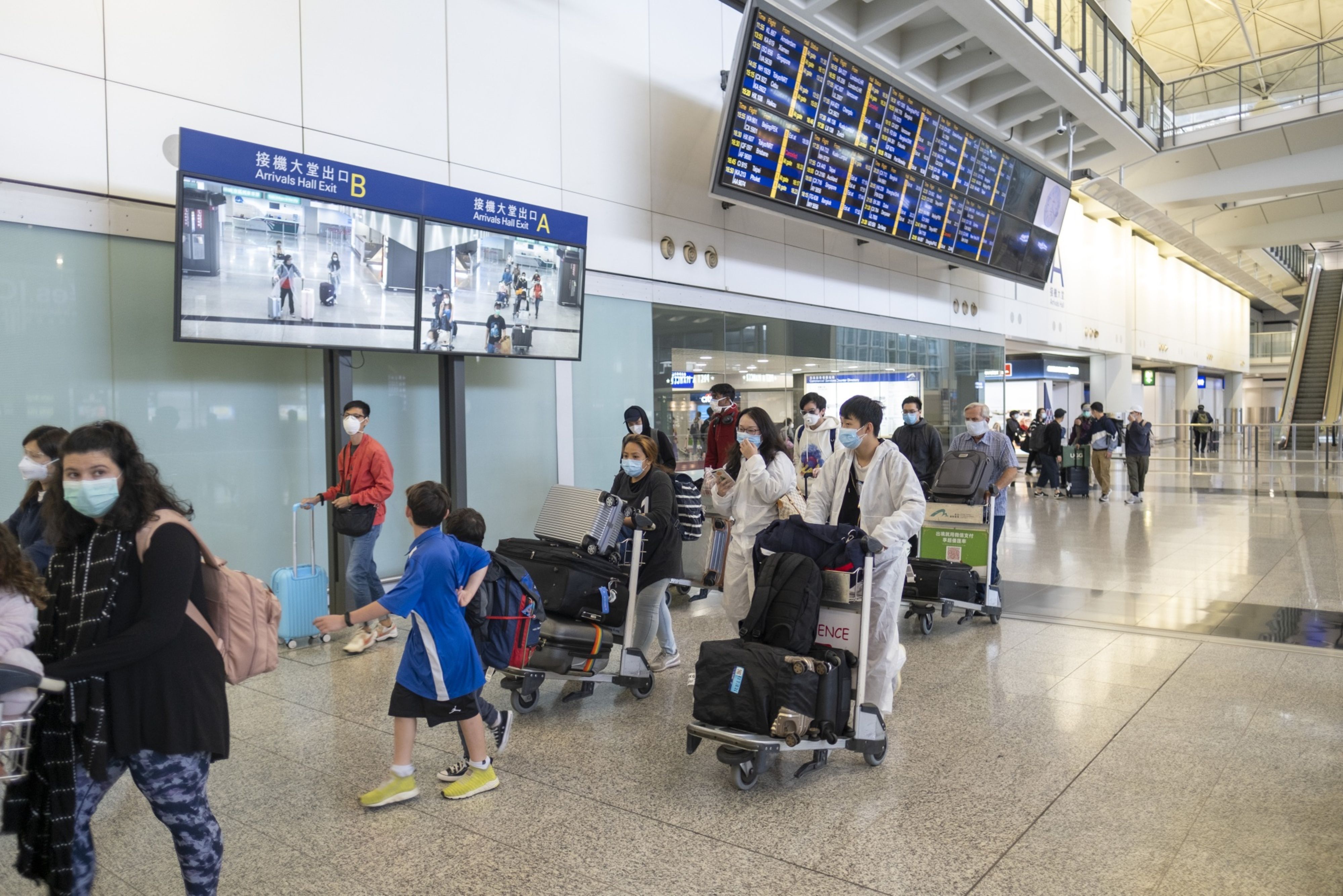 Hong Kong has one of the most extreme travel quarantine policies - a soul-crushing 21-day hotel lockup awaits residents arriving from outside China [File: Justin Chin/Bloomberg]