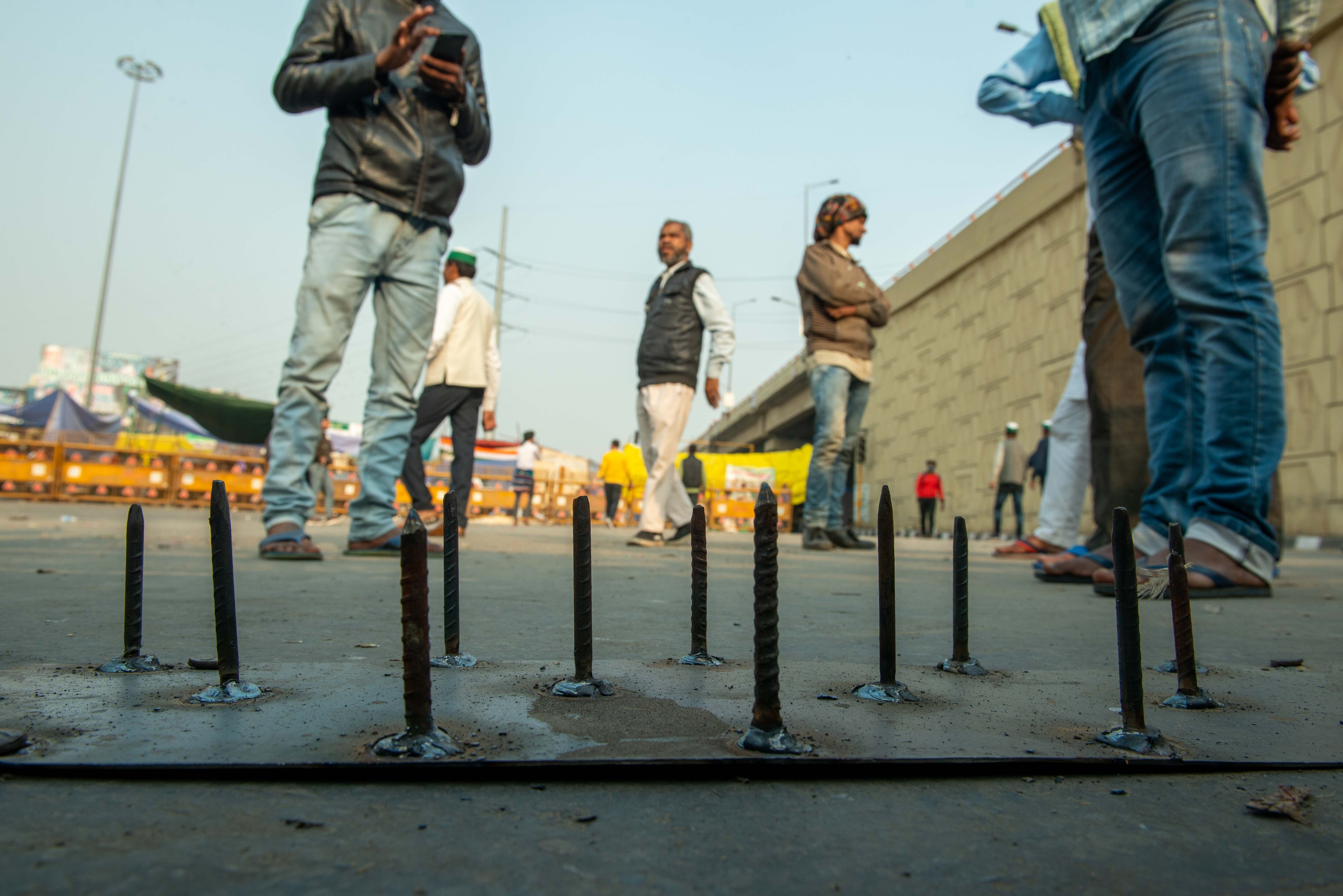 Huge nails were installed on roads by police to stop protesters from crossing the Ghazipur border, one of the sites of the months-long farmer protests [Pradeep Gaur/SOPA Images/LightRocket via Getty Images]