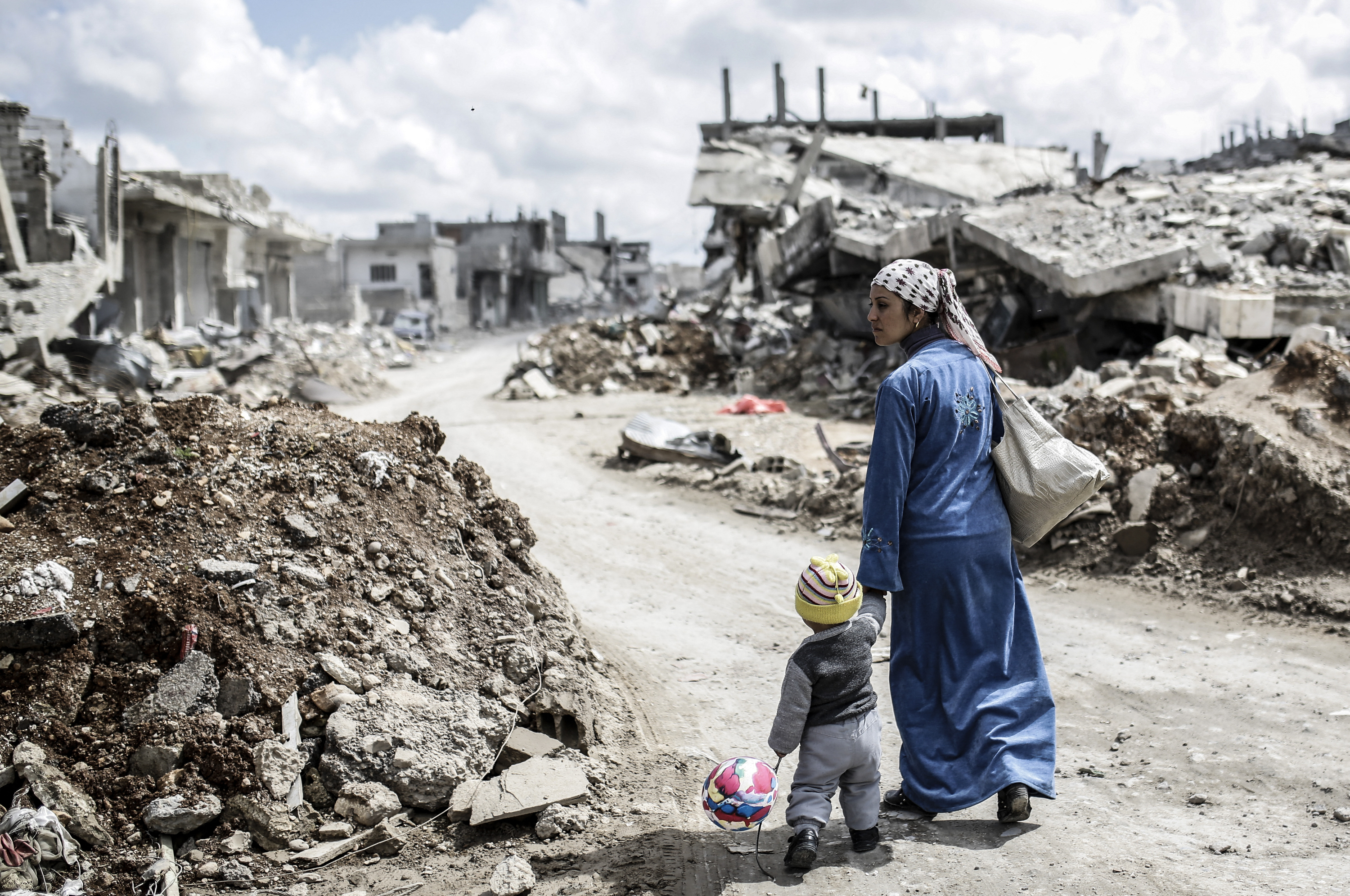 Nearly half a million people have been killed and more than half the pre-war population of 23 million displaced in the war [File: Yasin Akgul/AFP]