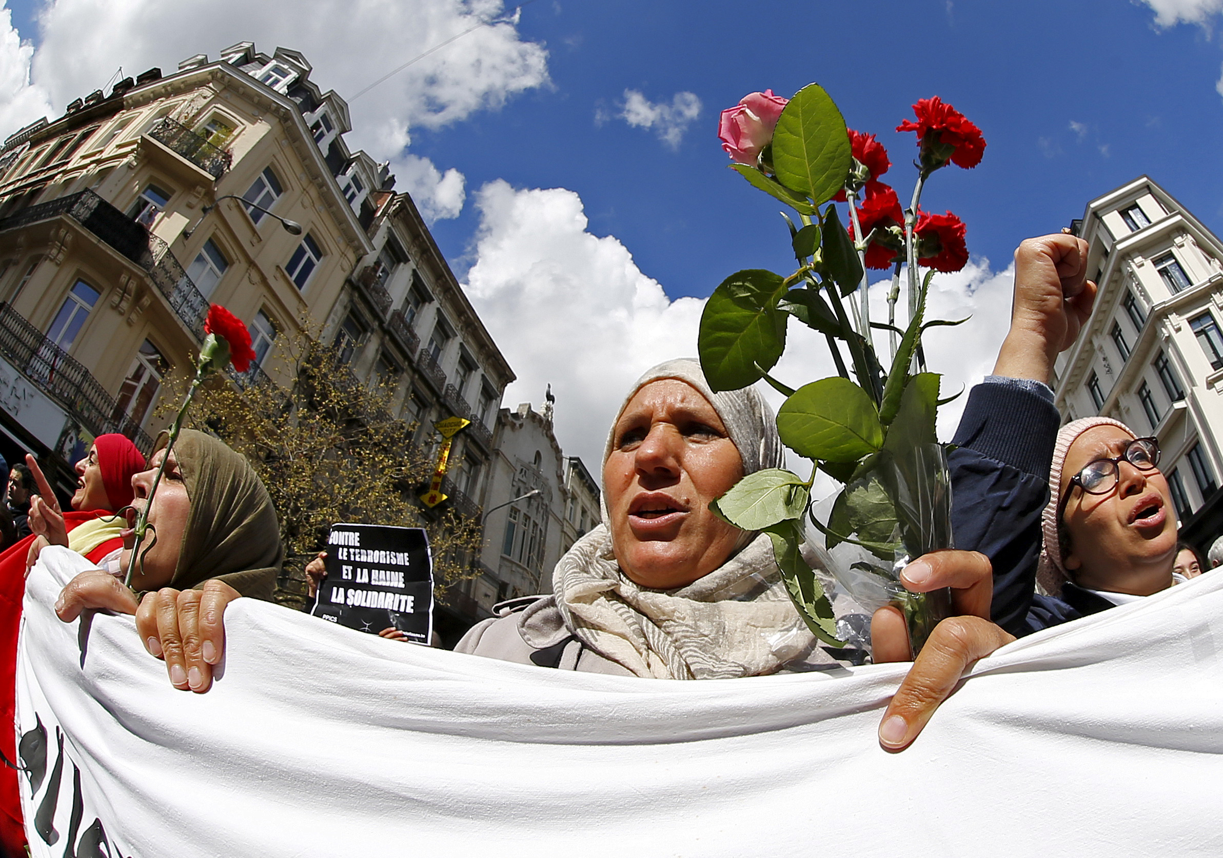 In this image from 2016, people take part in a rally called &#39;The march against the fear, Tous Ensemble, Samen Een, All Together&#39; in memory for the victims of bomb attacks [Yves Herman/Reuters]