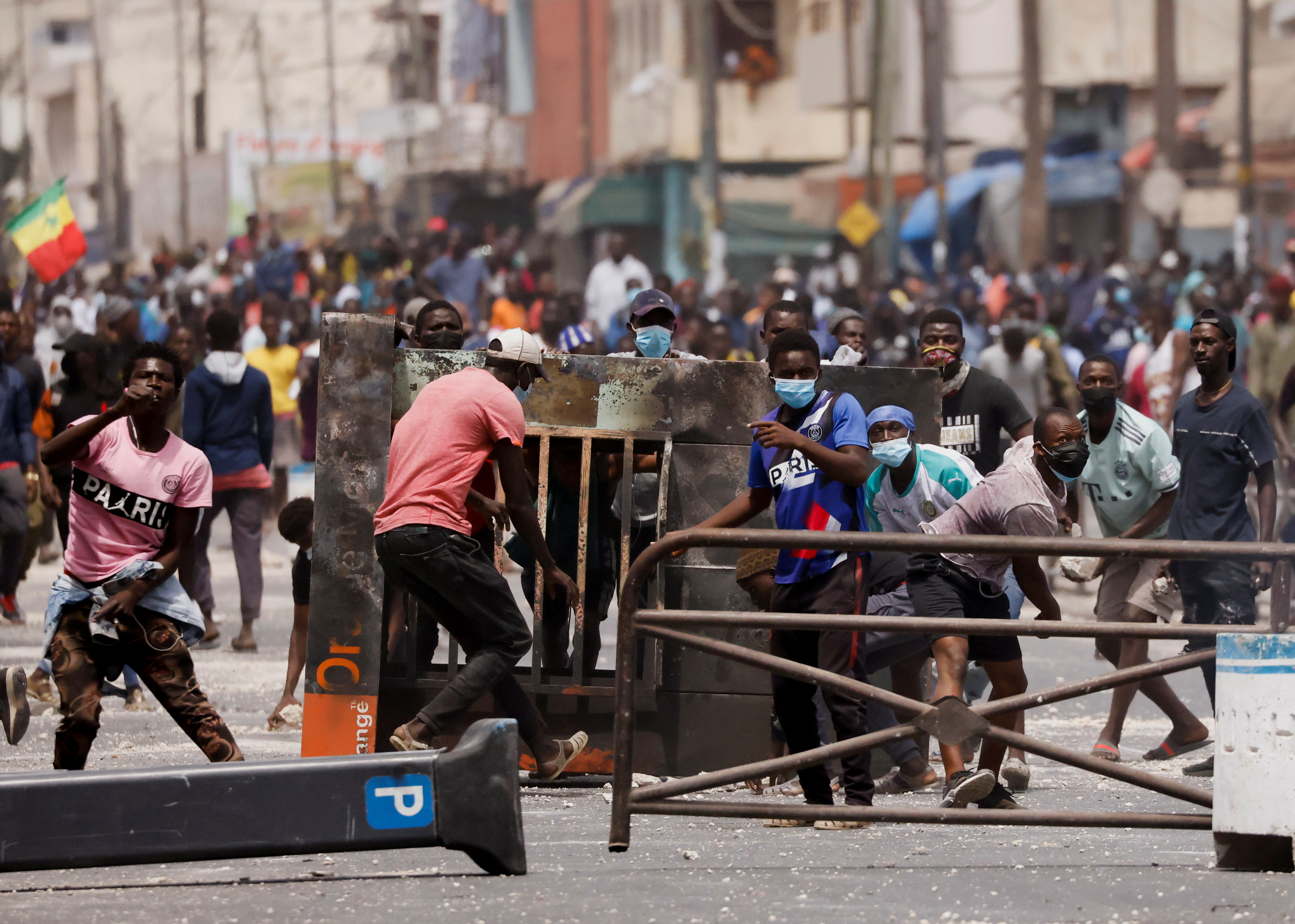 Supporters of opposition leader Ousmane Sonko clash with security forces in Dakar on Friday [Zohra Bensemra/Reuters]