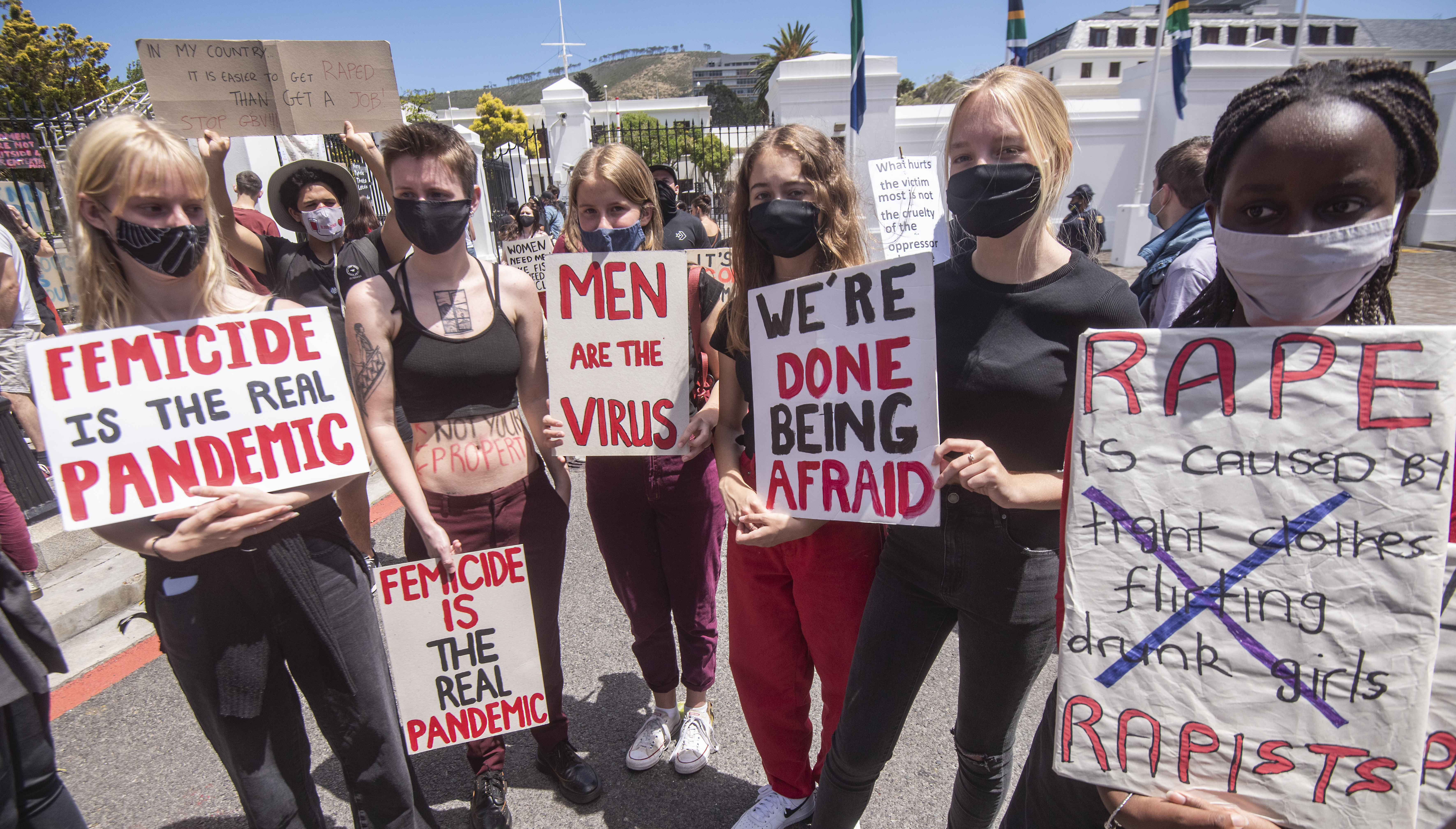 South African Women take part in a protest against gender-based violence nationwide gatherings during 16 Days of Activism on November 28, 2020 in Cape Town, South Africa. It is reported that about 200 protesters gathered outside parliament to protest against Gender Based Violence. (Photo by Brenton Geach/Gallo Images via Getty Images)