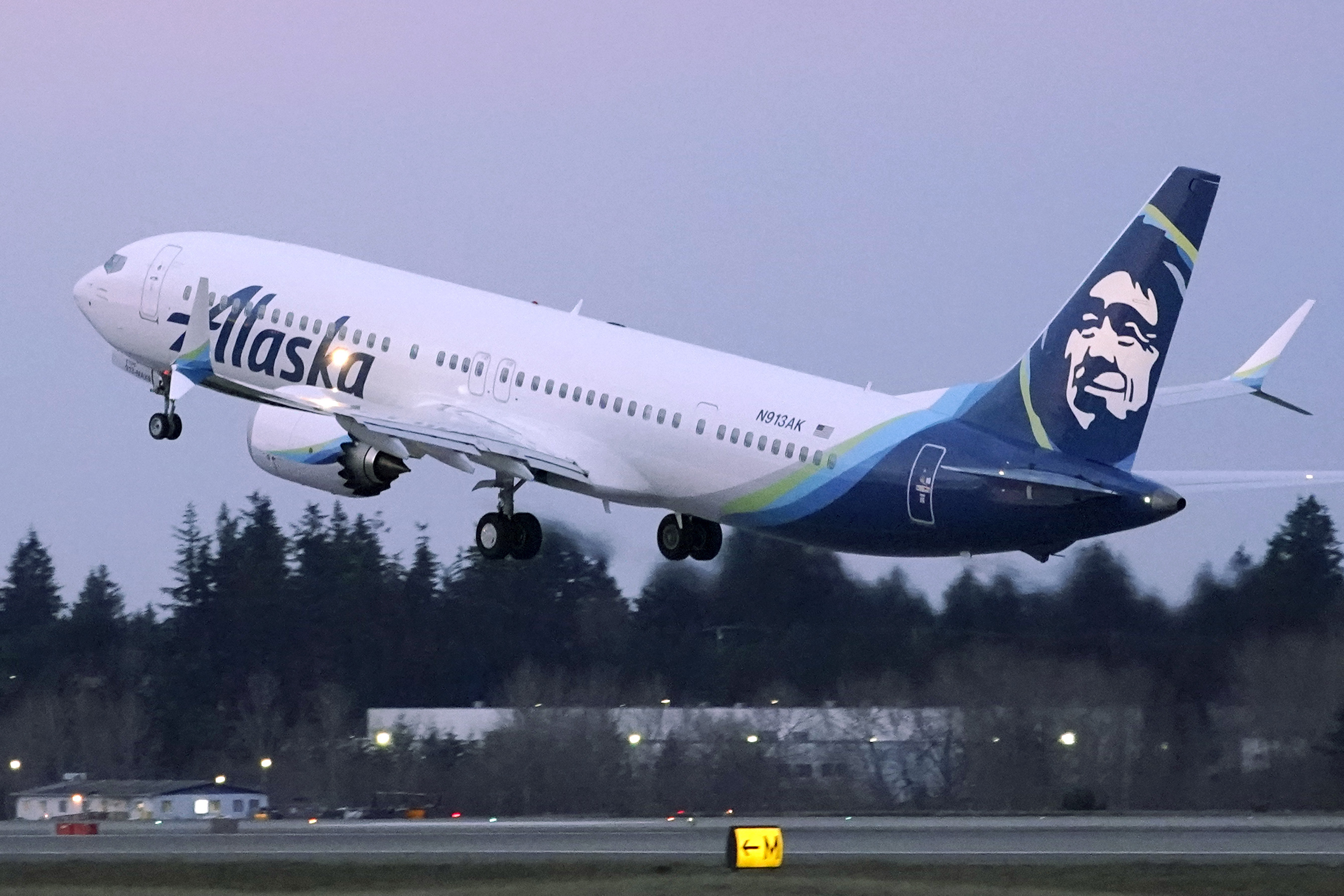 Boeing says 14 airlines around the world are now flying passengers on its 737 MAX jets, including American, United and Alaska Airlines [File: Ted S Warren/AP Photo]