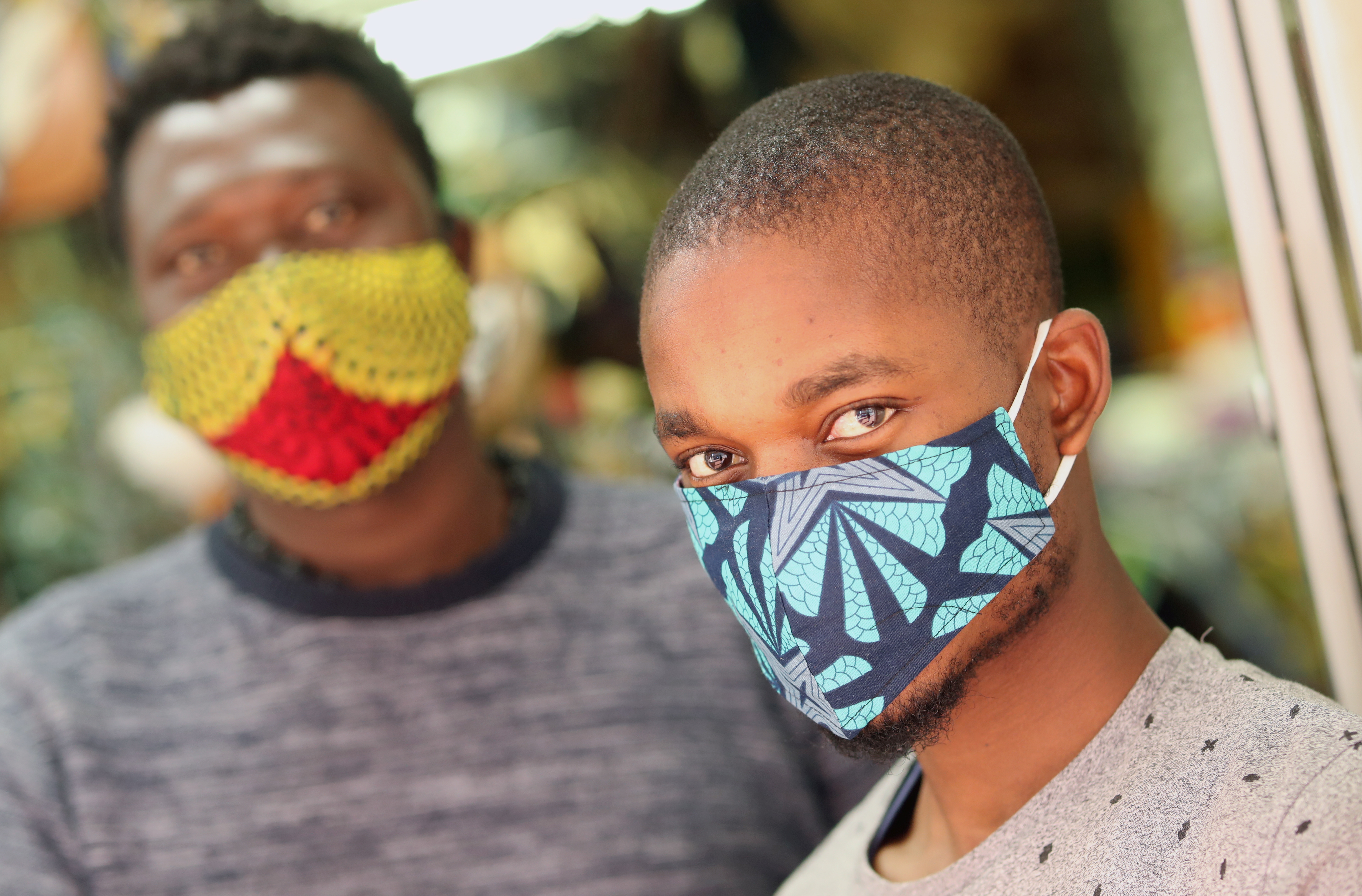Workers wear face masks at a fabric shop during the nationwide coronavirus disease (COVID-19) lockdown in Cape Town, South Africa May 15, 2020 (REUTERS/Mike Hutchings) (Reuters)