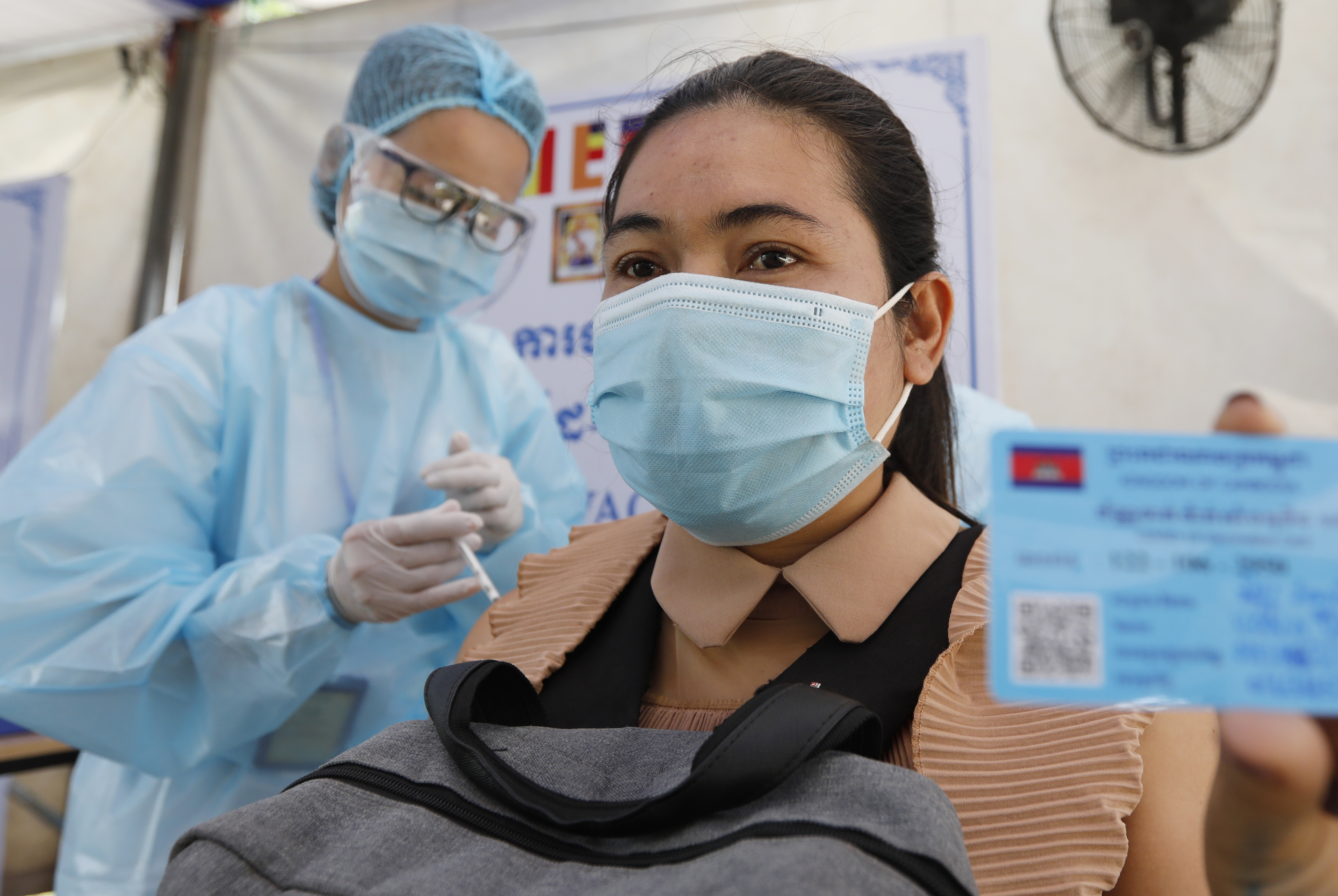 Cambodia recently administered its1 1,000,000th dose of COVID-19 vaccine, but cases have surged in the past few weeks, driven by the emergence of the UK variant [Mak Remissa/EPA]