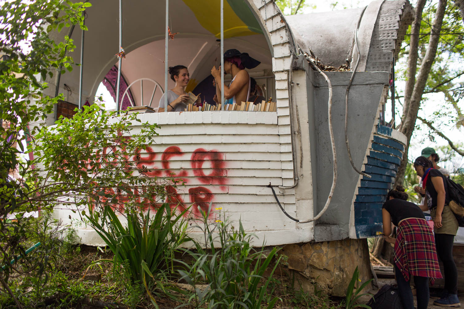 A small police station that was burned during the early days of the protest has been adapted as a &#39;popular library&#39; in the neighbourhood of San Antonio. [Mauricio Morales/Al Jazeera]