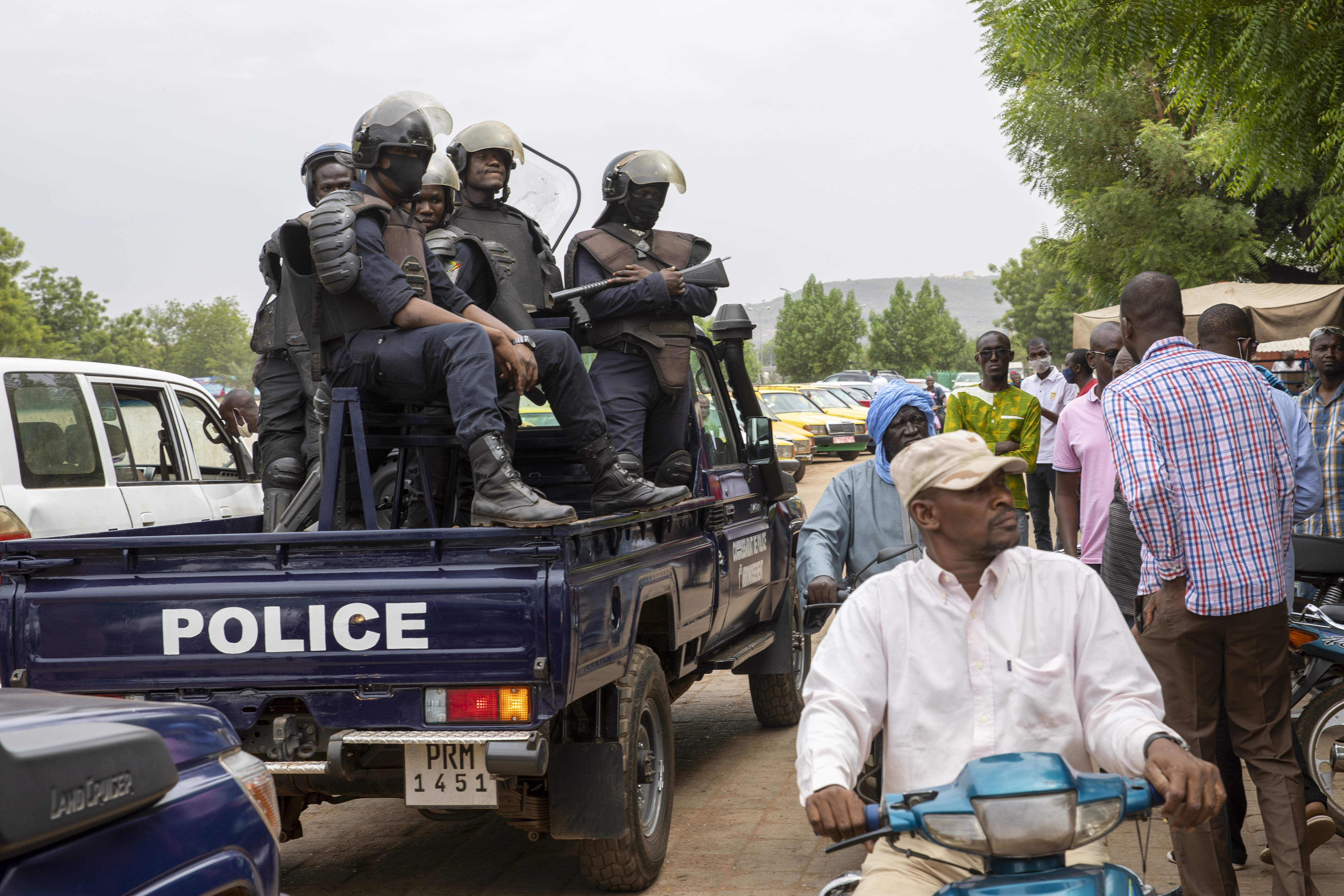 The Malian police gather outside the Bourse du Travail where striking workers gathered to protest against the arrest of President Bah Ndaw and Prime Minister Moctar Ouane by military personnel in Bamako, Mali, May 25, 2021 [File: AP Photo]