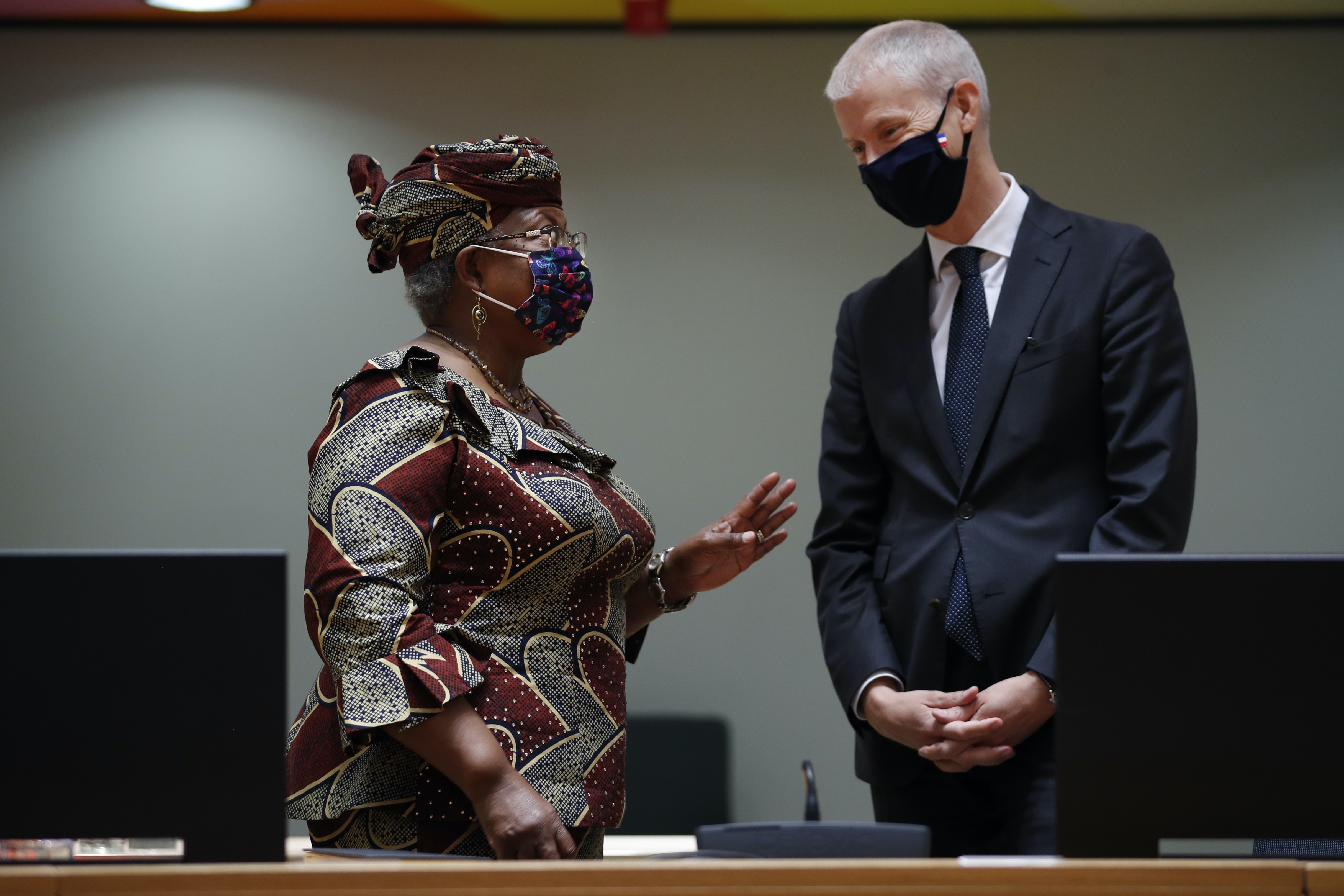 World Trade Organization Director-General Ngozi Okonjo-Iweala, left, told European Union legislators that normal market forces for exports and imports couldn&#39;t apply when it comes to the life-or-death issue of COVID-19 vaccines [File: Francisco Seco/AP Photo]