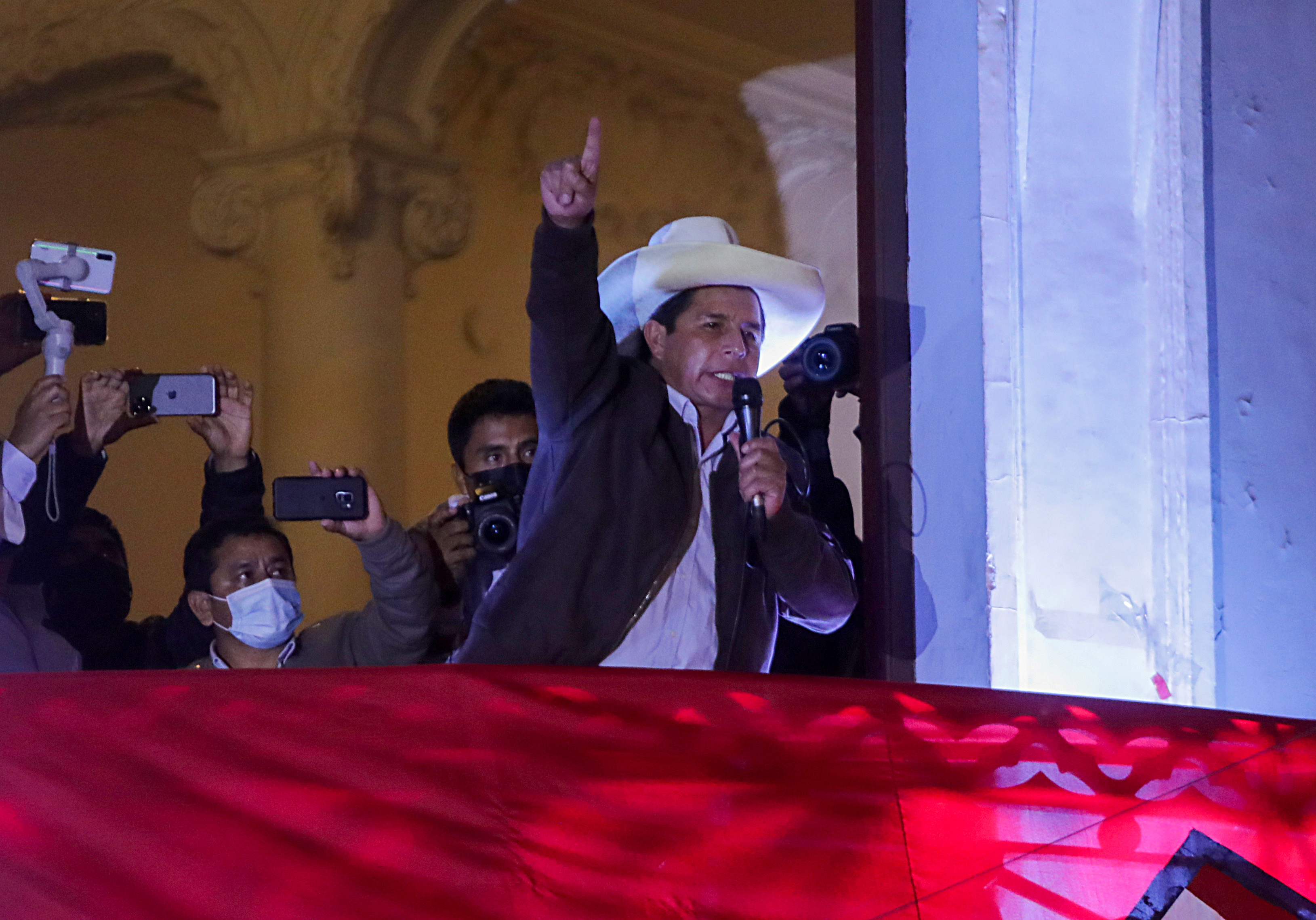 Pedro Castillo addressing supporters from the headquarters of the &#39;Free Peru&#39; party in Lima, Peru [Sebastian Castaneda/Reuters]