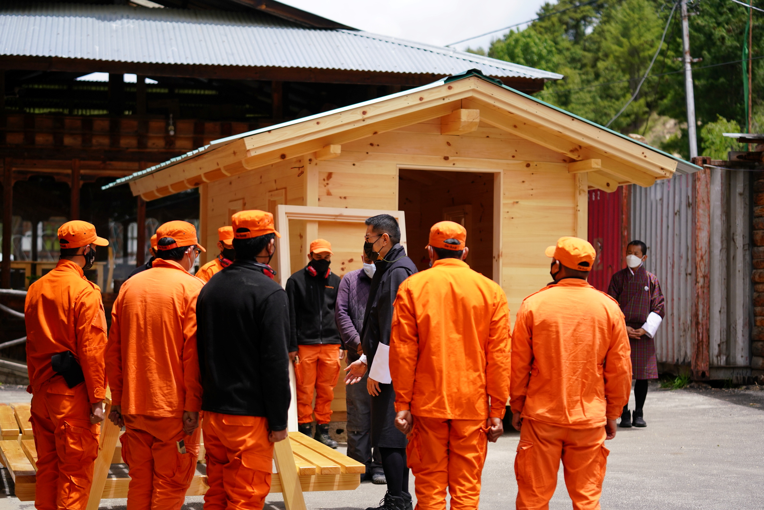 Bhutan's king during his visit to a remote village to oversee measures to contain the spread of the coronavirus disease [Royal Office for Media/Handout via Reuters]