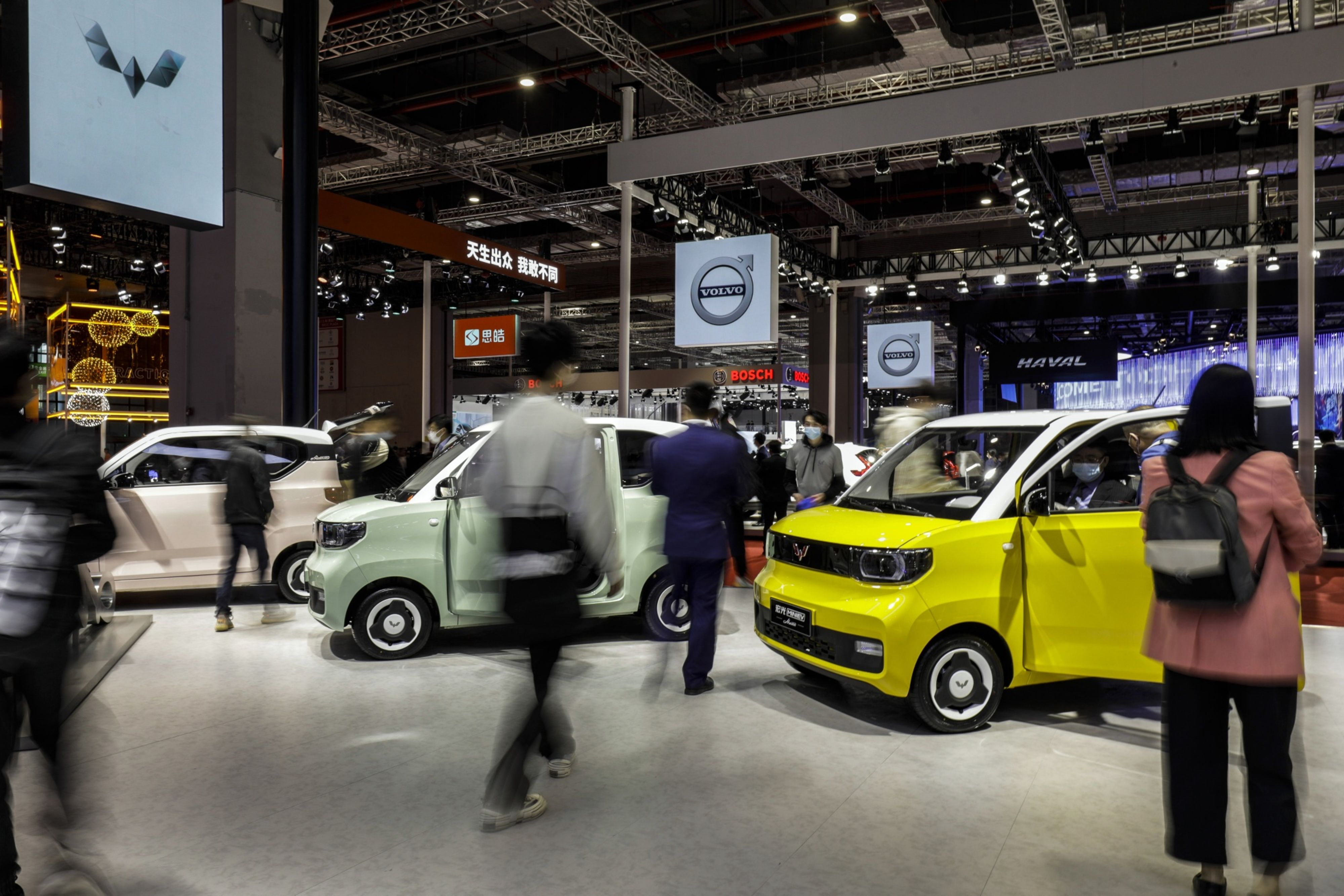 The Wuling Hongguang Mini is sold in macaron colours of avocado green, lemon yellow and white peach pink [File: Qilai Shen/Bloomberg]
