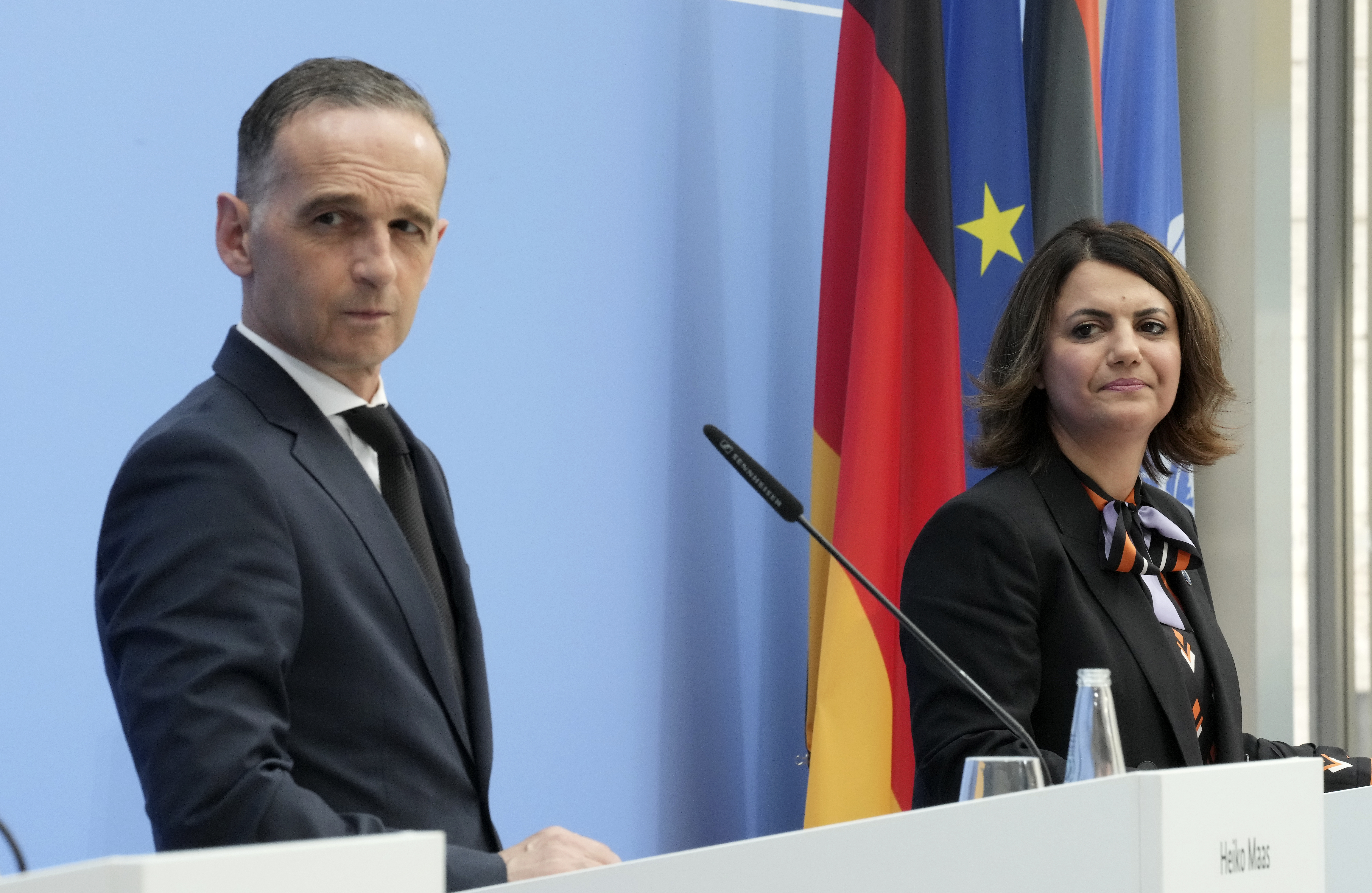 German Foreign Minister Heiko Maas, left, and Libyan Foreign Minister Najla Mangoush attend a joint press conferences part of the &#39;Second Berlin Conference on Libya&#39; at the foreign office in Berlin [Michael Sohn/Pool/AP Photo]