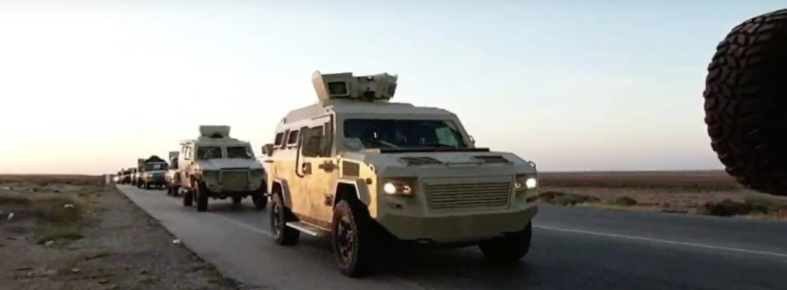 Haftar&#39;s forces published pictures of their armoured vehicles positioned in and around the border crossing [Screengrab/Al Jazeera via Haftar Media]
