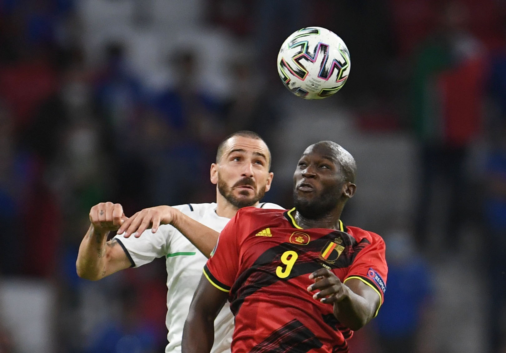 Belgium's Romelu Lukaku in action with Italy's Leonardo Bonucci Pool during the Euro 2020 quarter final (Belgium v Italy) in Munich, Germany on July 2, 2021. [Andreas Gebert/Reuters]