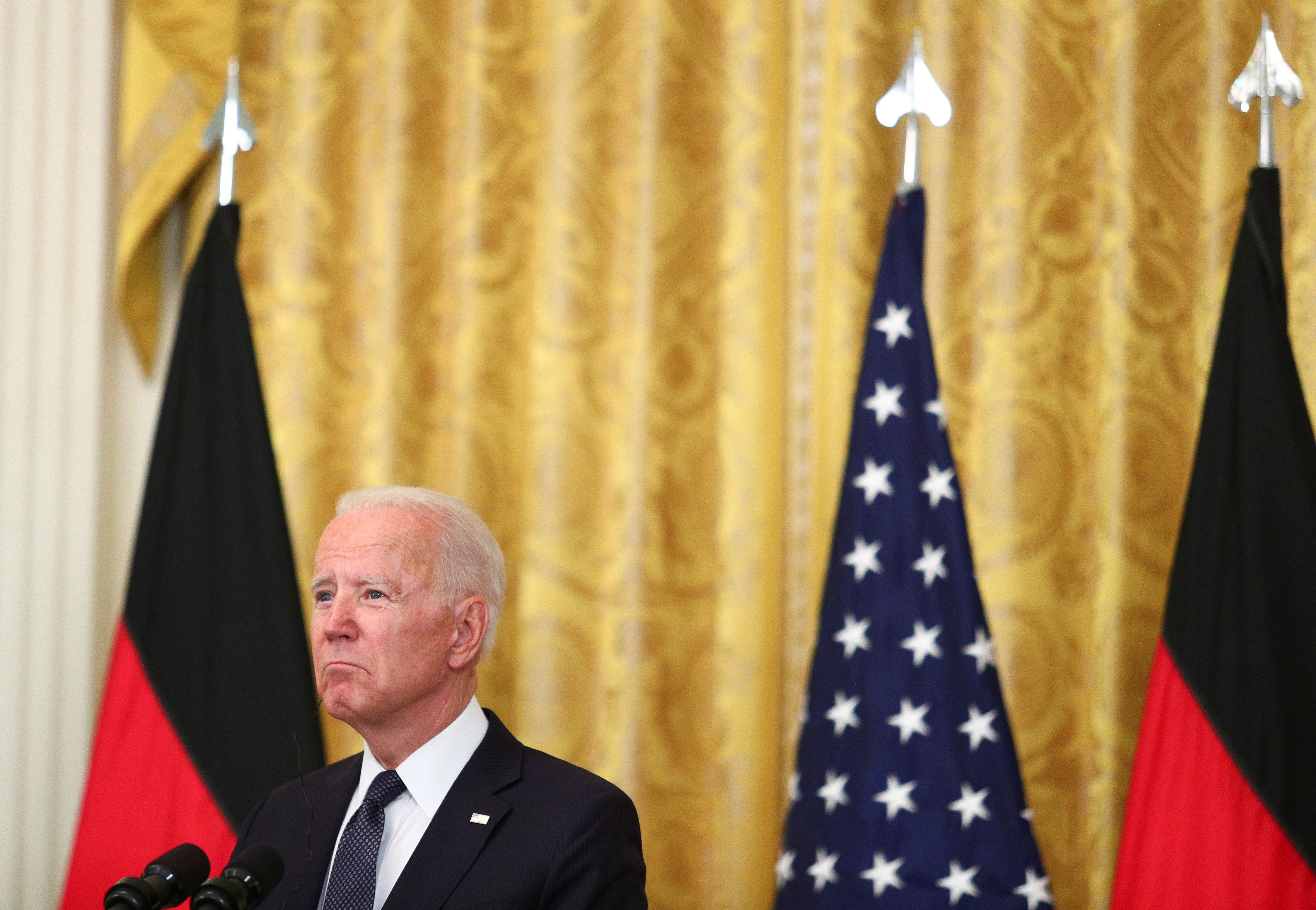 US President Joe Biden and German Chancellor Angela Merkel, not pictured, attend a joint news conference in the East Room at the White House in Washington, US, July 15, 2021 [Tom Brenner/Reuters]
