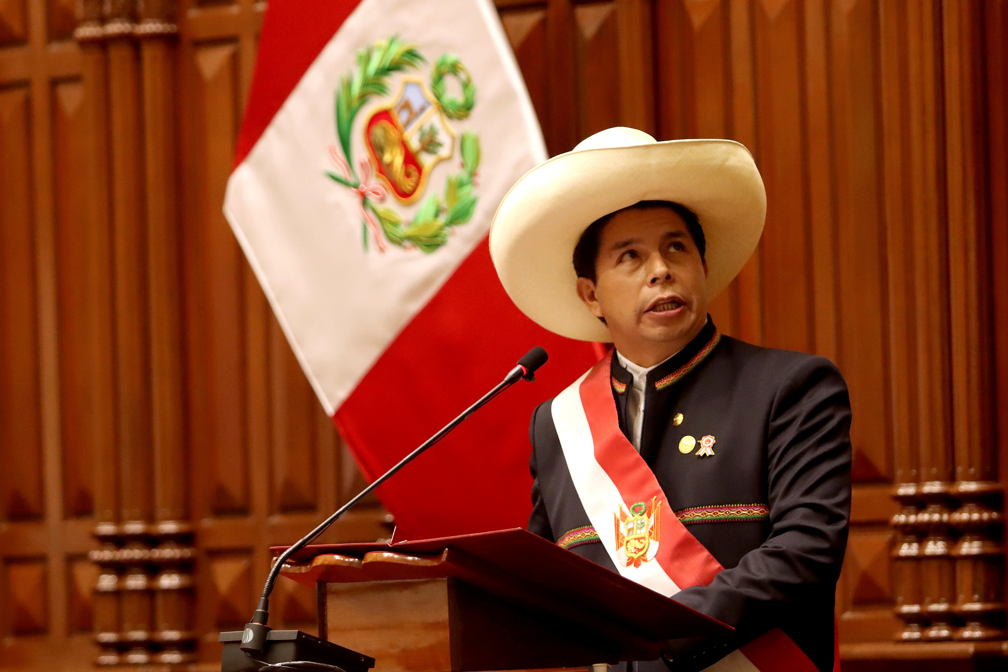 Peru&#39;s President Pedro Castillo addresses the law makers and invitees during the Inauguration Day at the Congress in Lima, Peru [Peru&#39;s Presidency/Handout via Reuters]