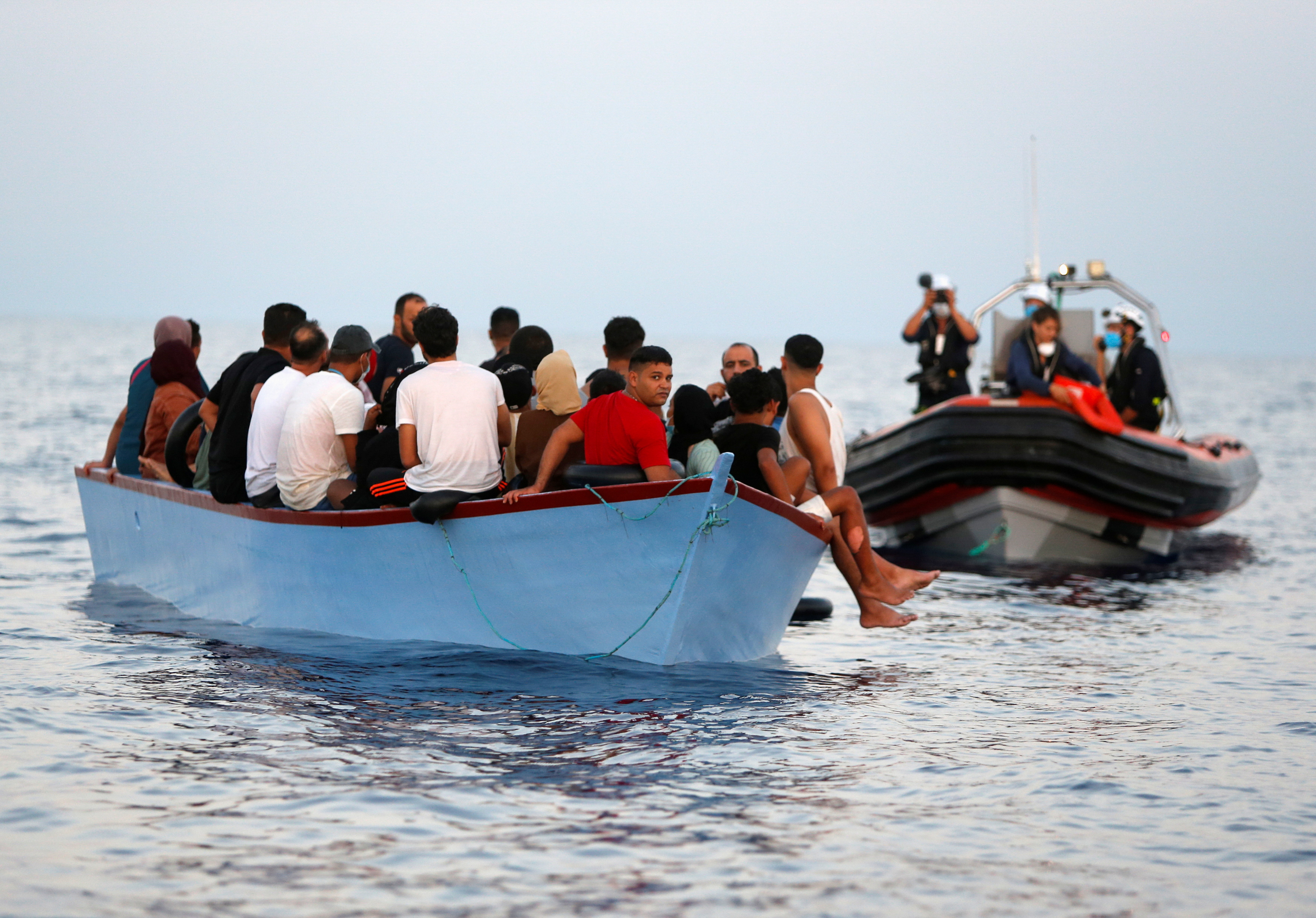 Europe-bound Libyans face abuse in detention centres and at the hands of traffickers, the report found [File: Darrin Zammit Lupi/Reuters]