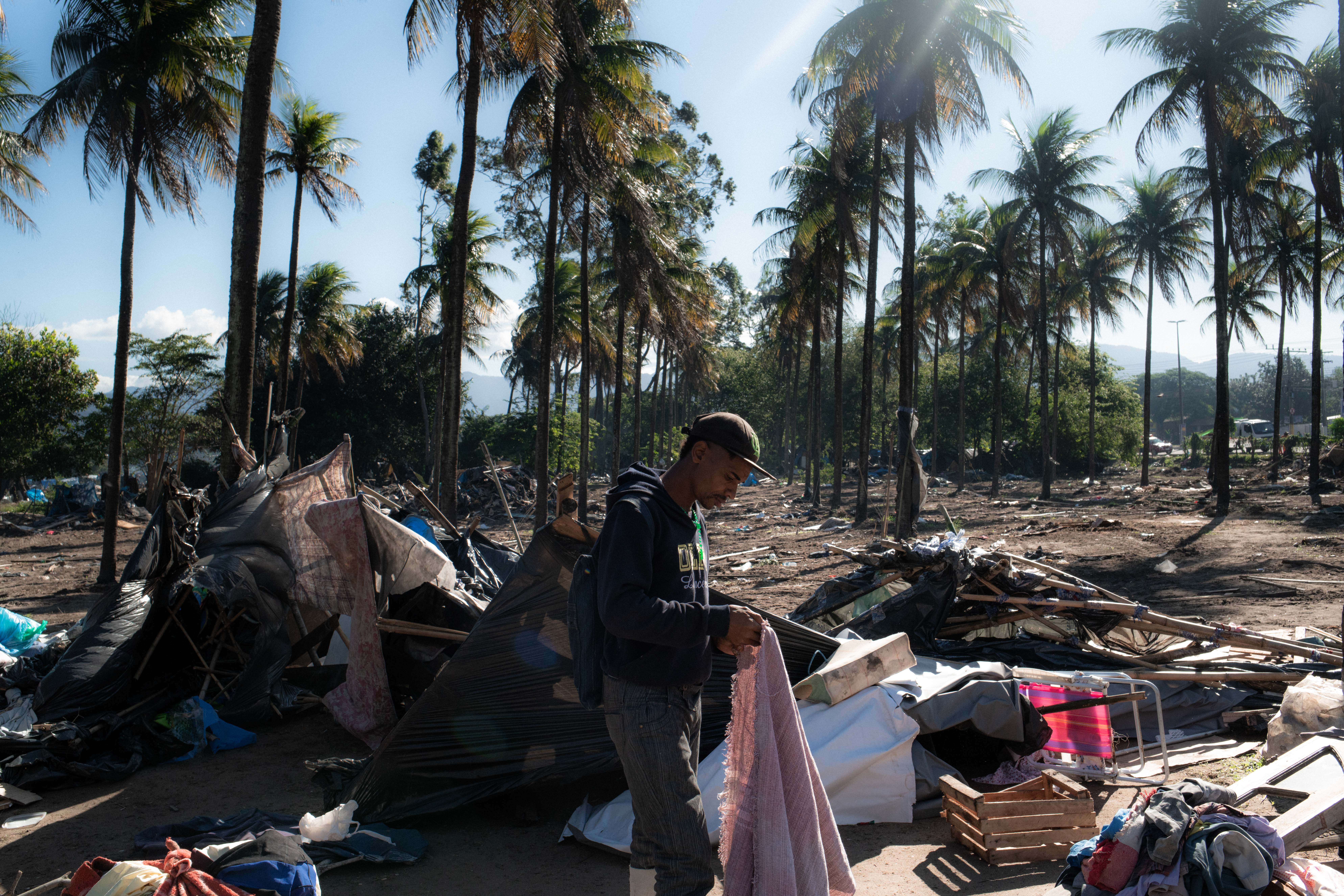 Residents of the &#39;First of May Refugee Camp&#39; were evicted last week from land that belongs to state oil firm Petrobras and that they had occupied in Itaguai, Rio de Janeiro, Brazil, making a difficult situation worse for thousands who had called the settlement home [Ian Cheibub/Al Jazeera]