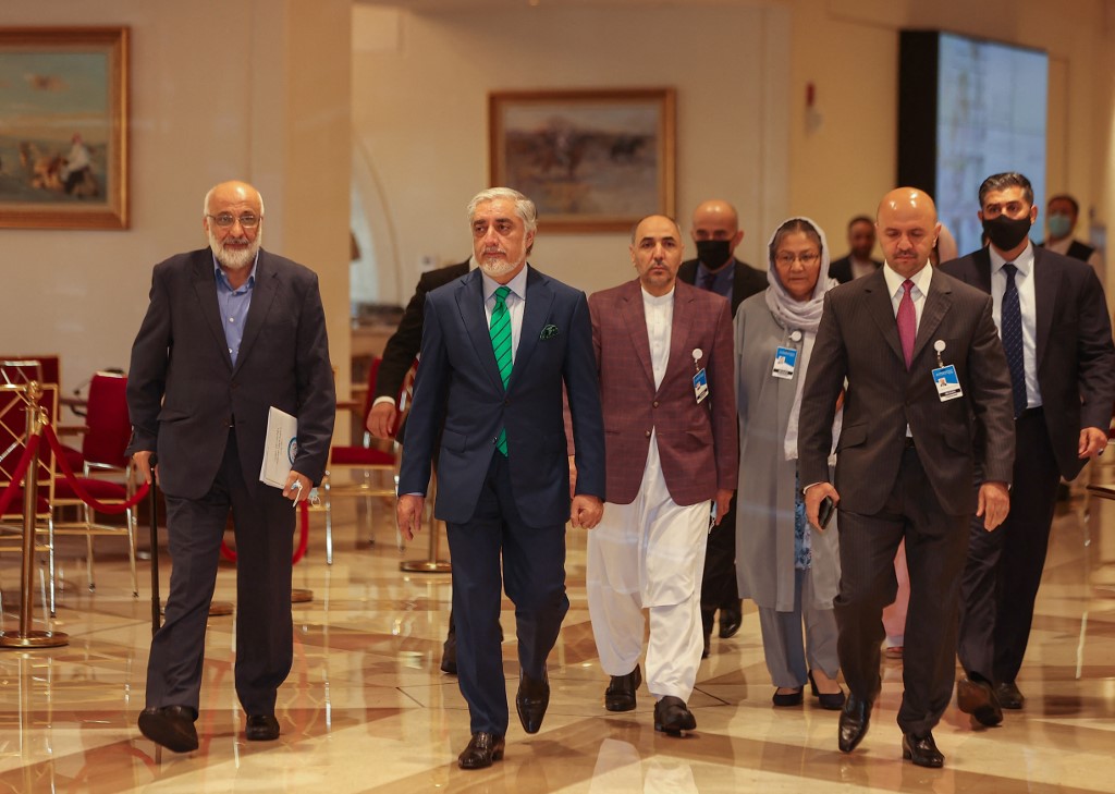 Head of Afghanistan&#39;s High Council for National Reconciliation Abdullah Abdullah walks in a hotel lobby in Qatar&#39;s capital Doha during an international meeting on the escalating conflict in Afghanistan on August 10, 2021 [Karim Jaafar/AFP]