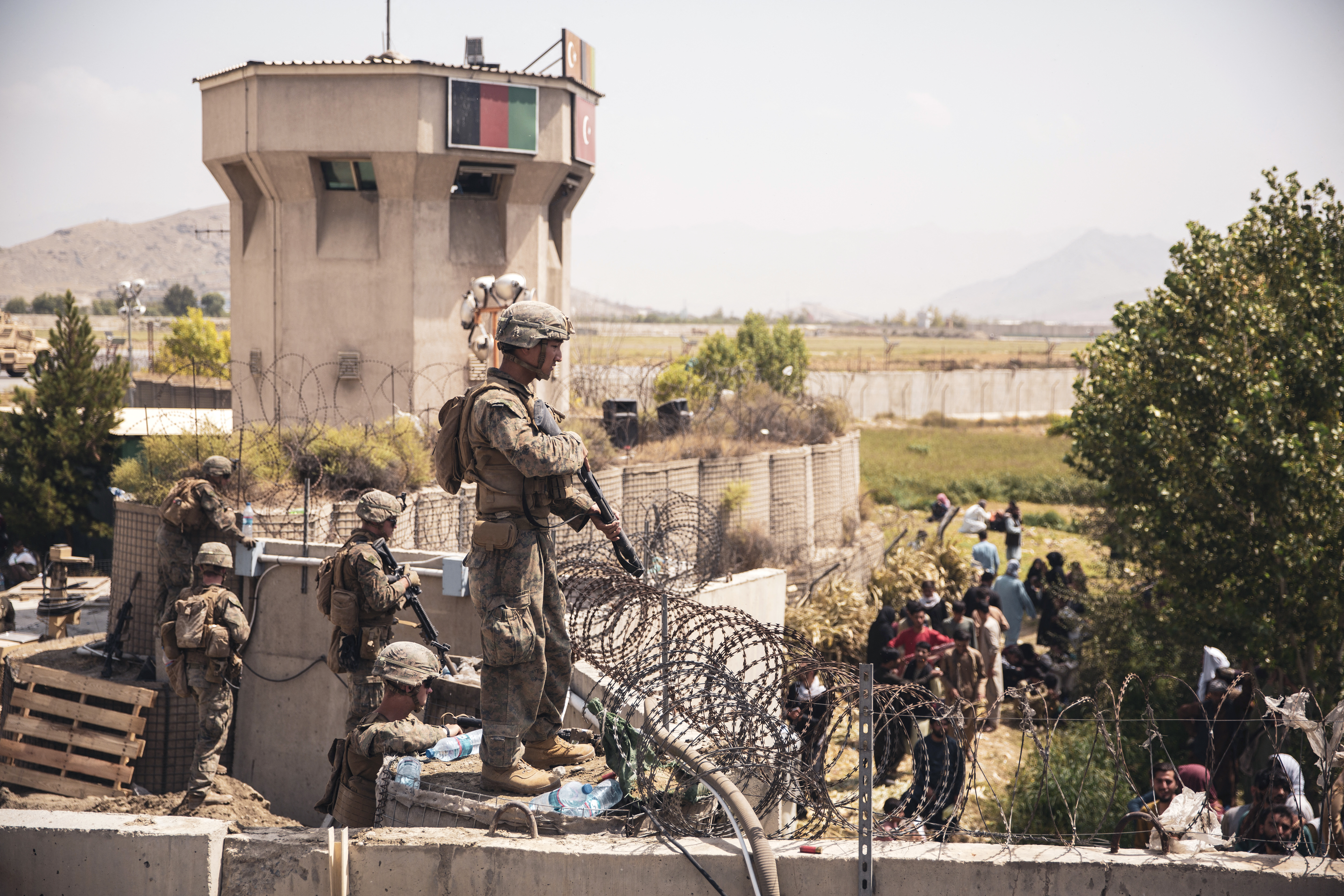 US forces assist with security at Kabul airport [Victor Mancilla/US Central Command Public Affairs/AFP]