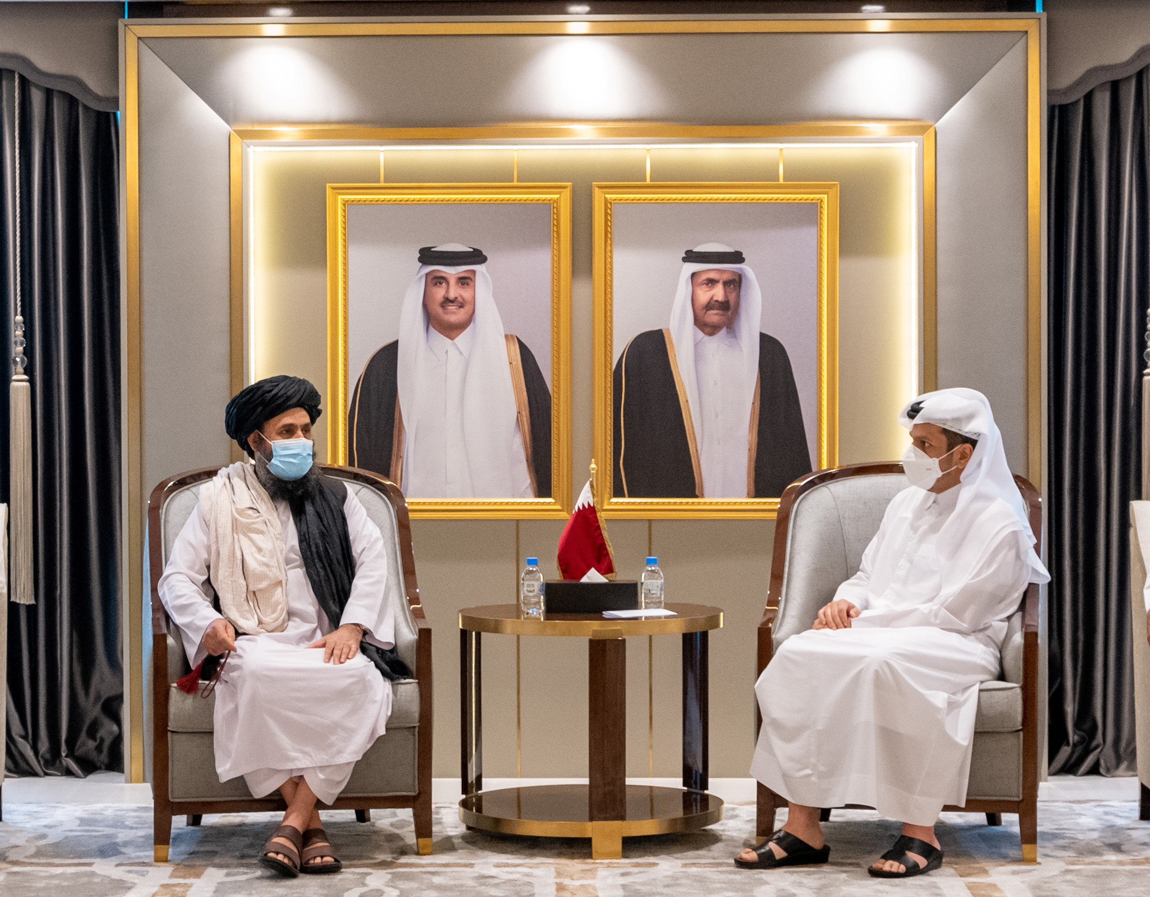 Mullah Abdul Ghani Baradar, left, meets Qatar&#39;s Minister of Foreign Affairs Mohammed bin Abdulrahman Al Thani [Qatar News Agency via Reuters]