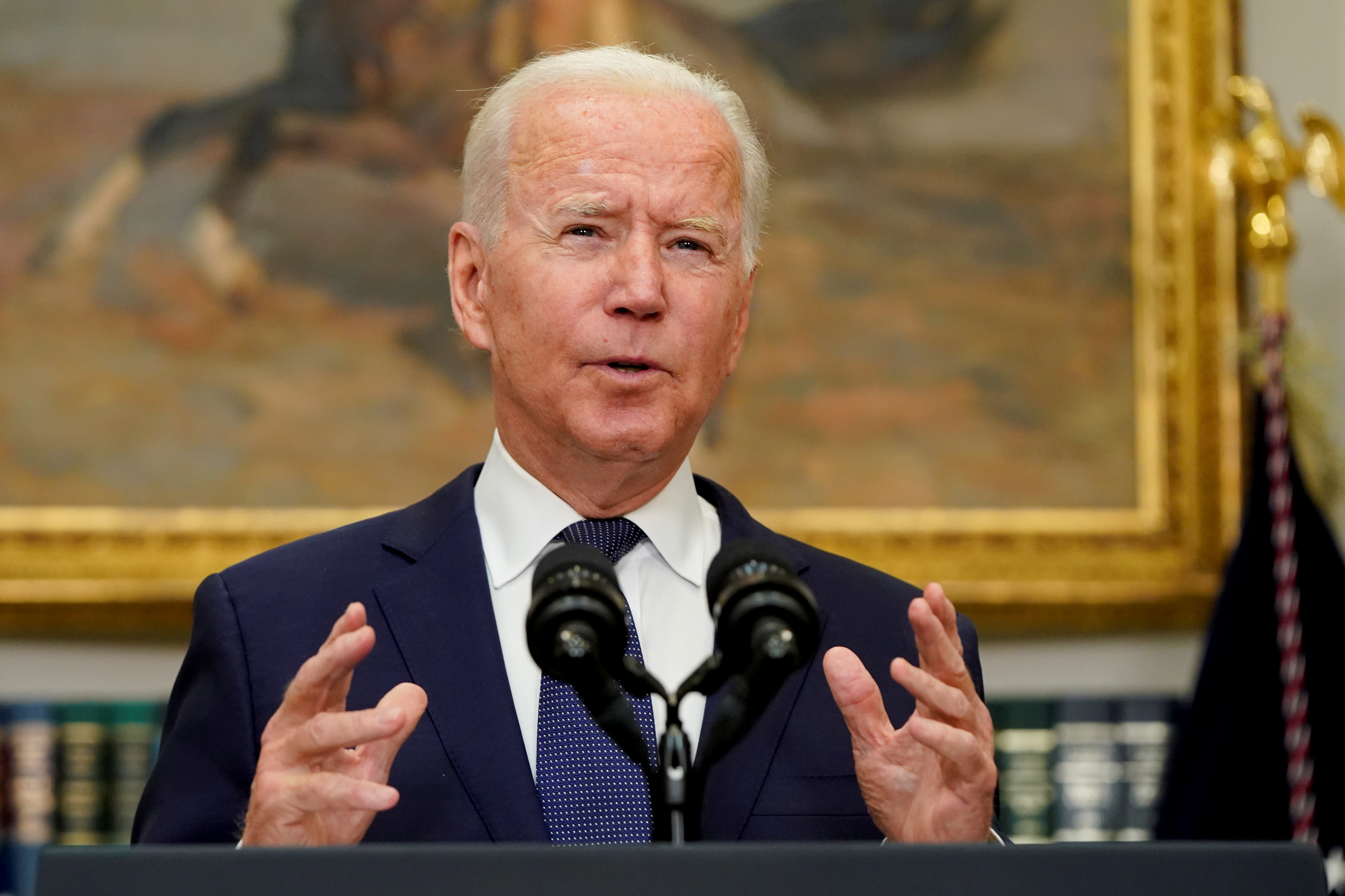 US President Joe Biden said evacuating Americans from Kabul is the &#39;first priority&#39; of his administration [Joshua Roberts/Reuters]