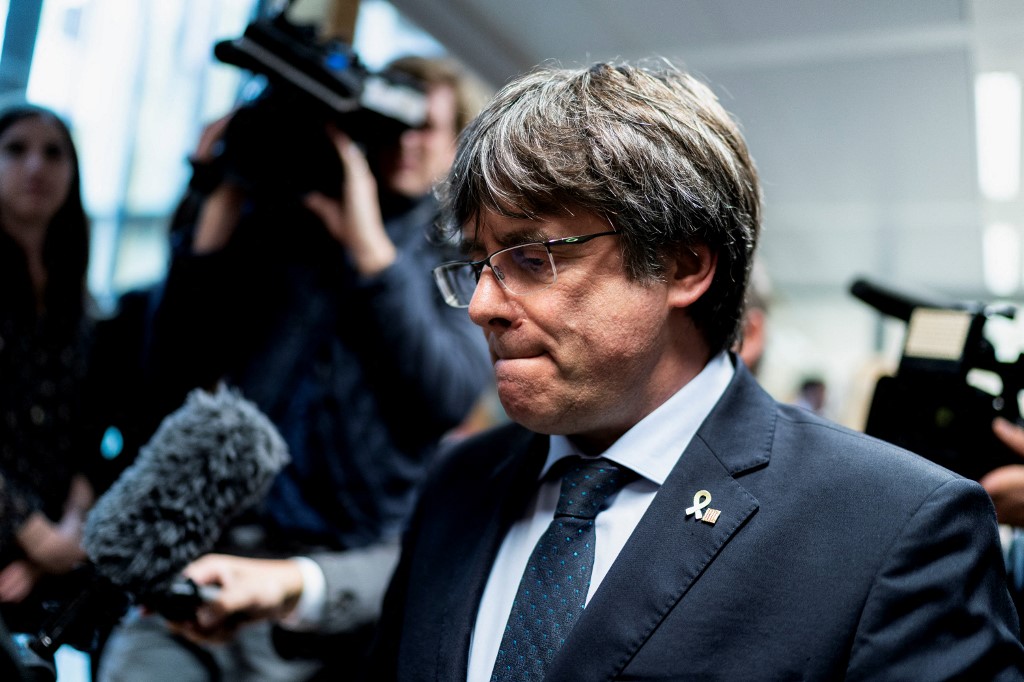 Puigdemont, 58, is wanted in Spain on allegations of sedition over his attempts to have the Catalan region break away from Madrid through the 2017 referendum [File: Kenzo Tribouillard/AFP]