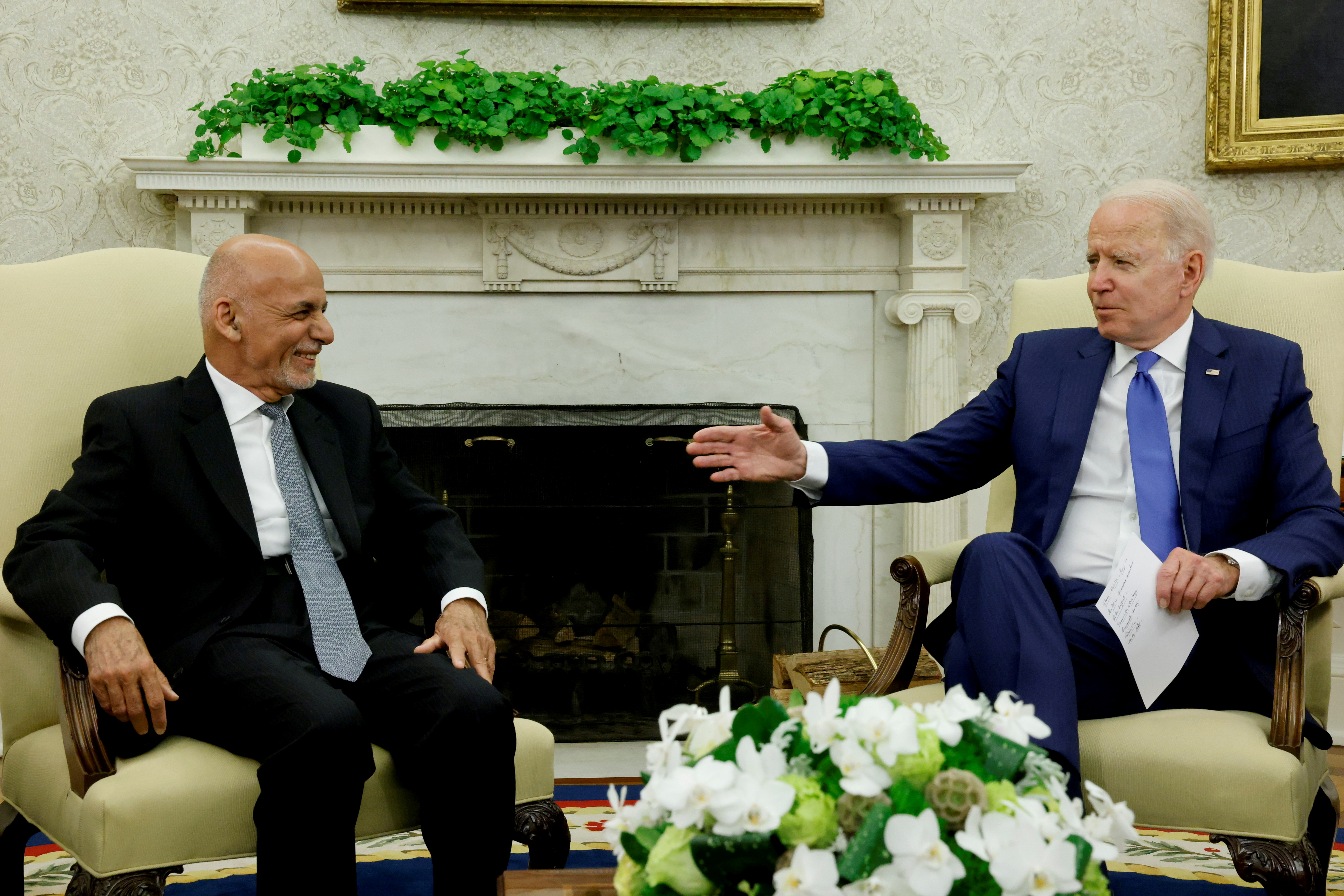 The men spoke for roughly 14 minutes on July 23, roughly a month before Ghani fled the presidential palace, and the Taliban entered Kabul [File: Jonathan Ernst/Reuters]