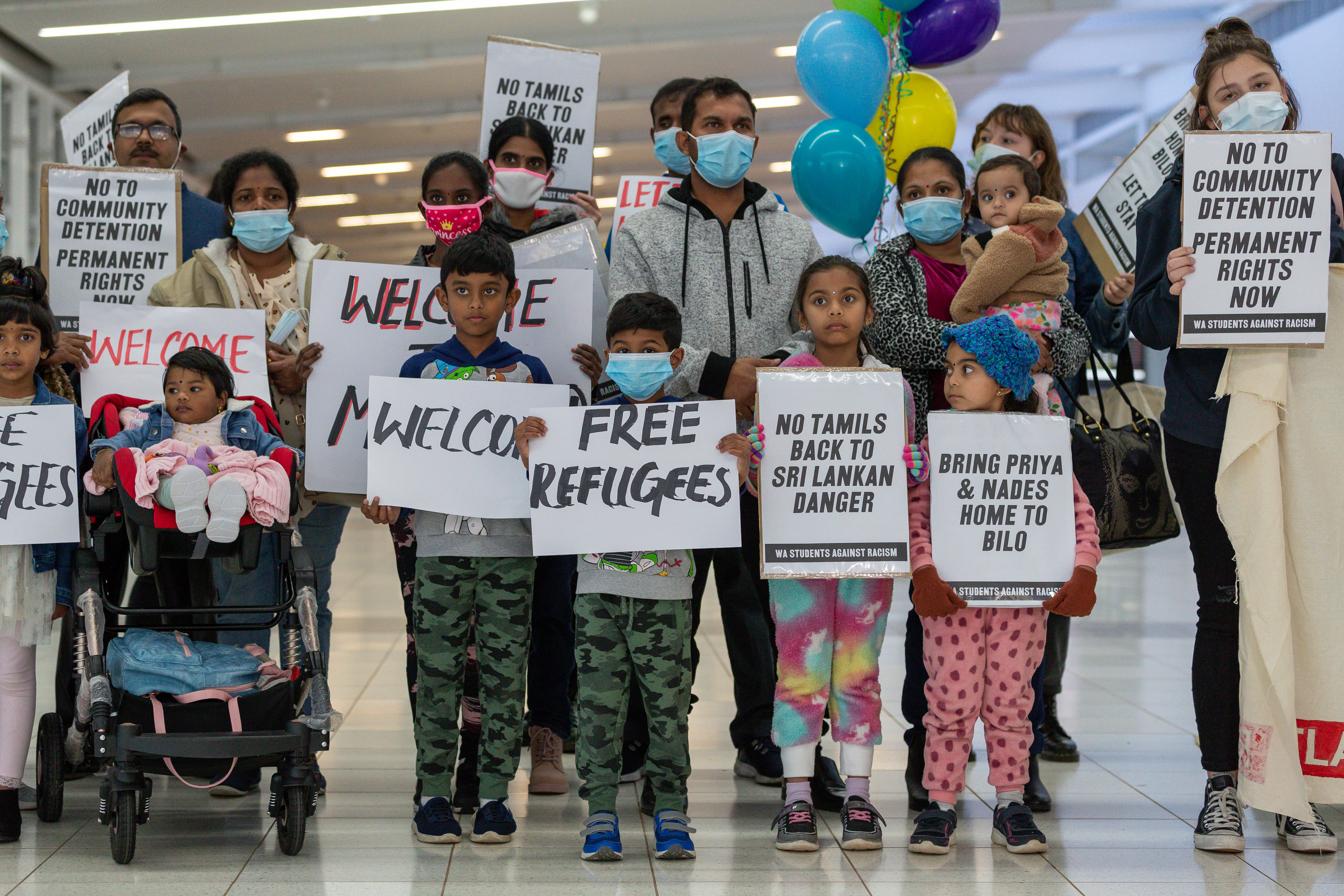 There is a growing public campaign to allow the Murugappan family to stay in Australia [File: Richard Wainwright/EPA]