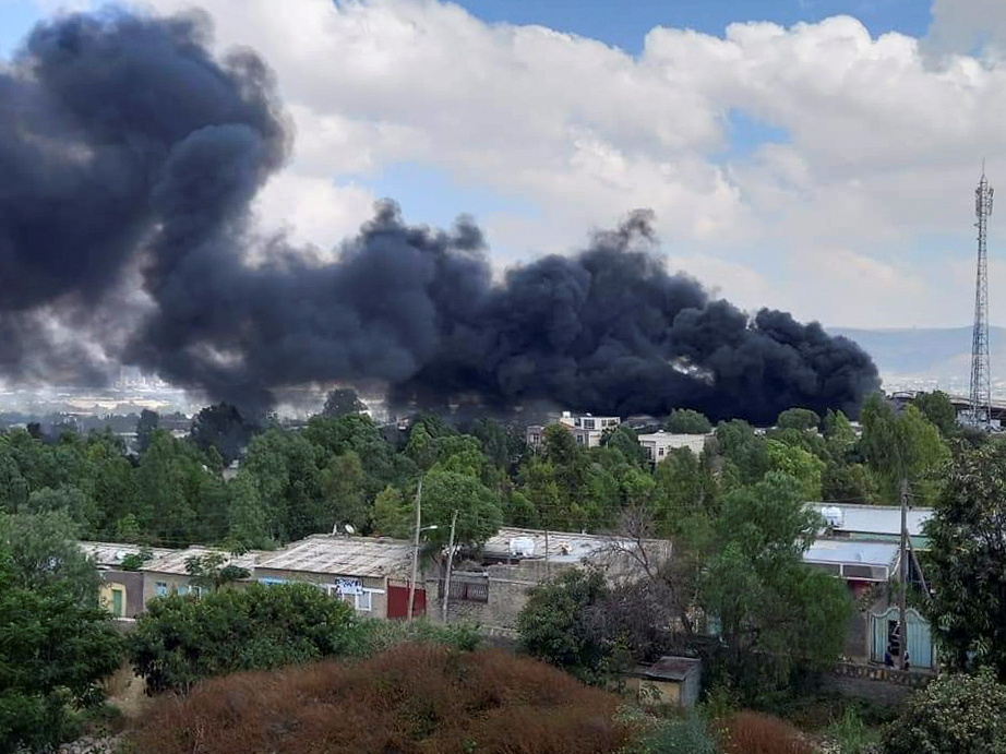 Smoke billows from the scene of an air raid in Mekelle, capital of the Tigray region, in 2021 [File: Reuters]