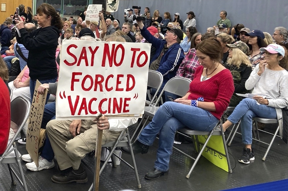 Advocates against vaccine mandates say the measures infringes on individual liberty and bodily autonomy [File: Holly Ramer/AP Photo]