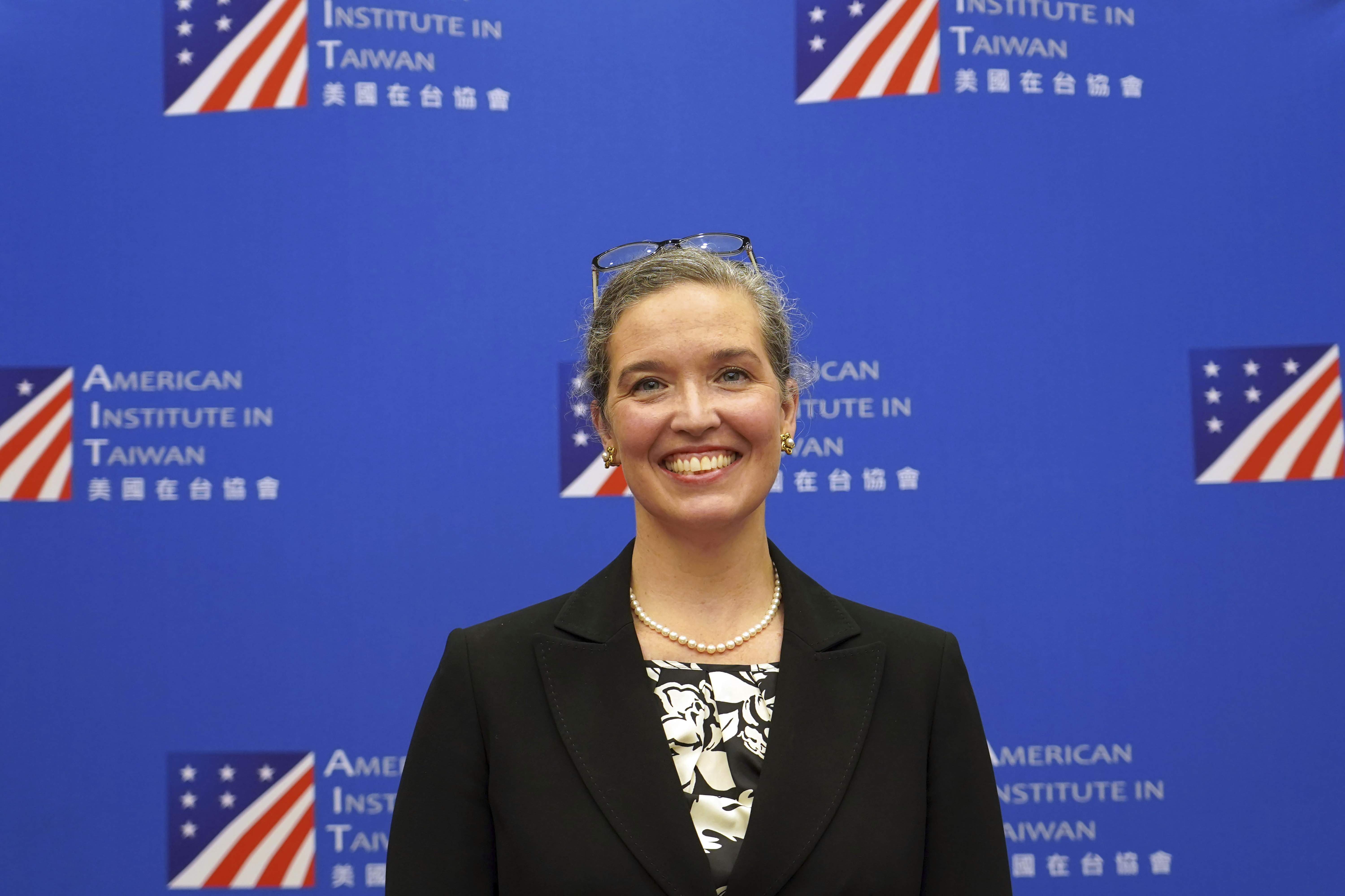 Sandra Oudkirk, the new director of the American Institute in Taiwan, the de facto embassy, said US wants to deepen ties with the self-governing island. [File: American Institute in Taiwan/The Associated Press]