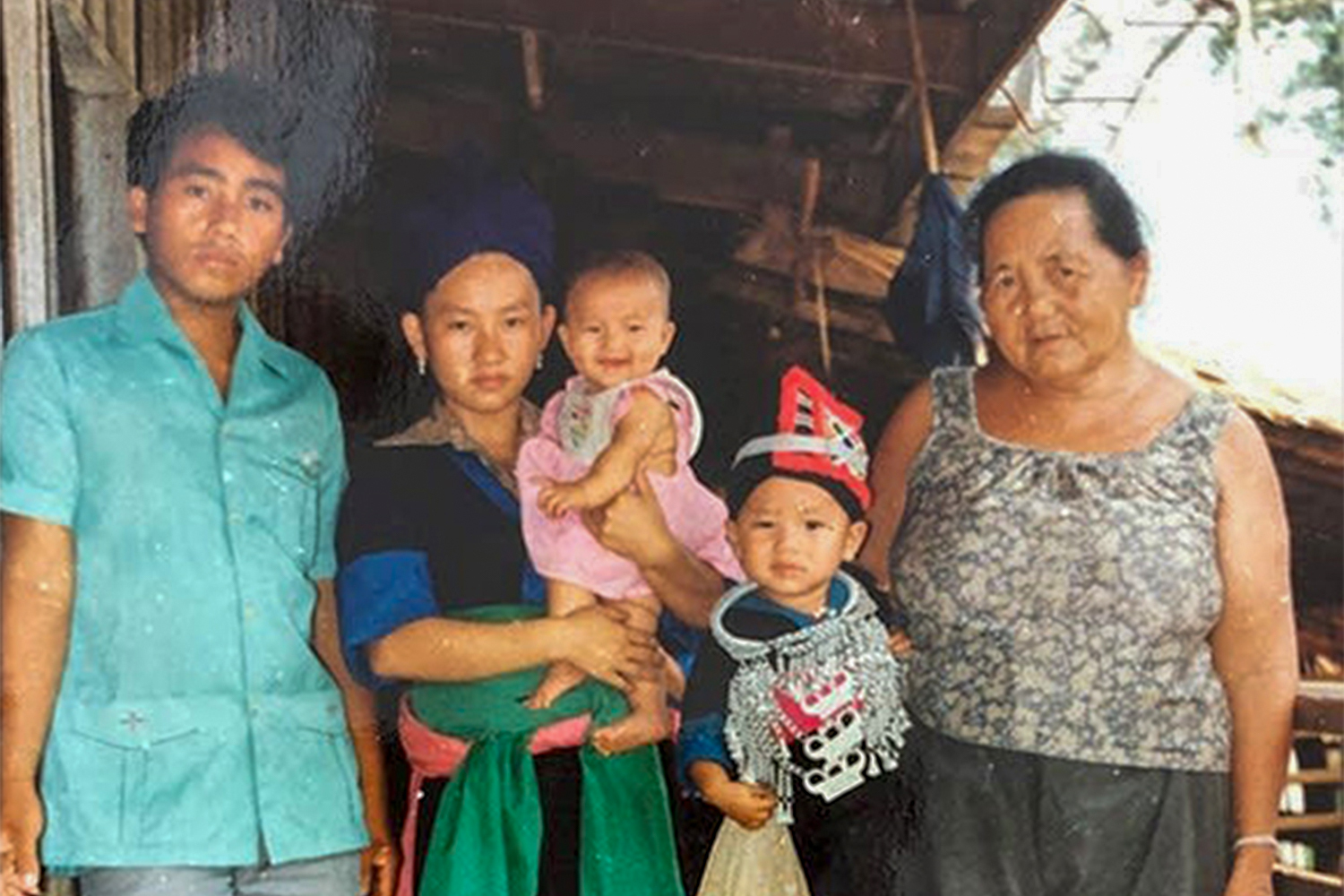 The author with her parents, sister and grandmother [Photo courtesy of Kao Kalia Yang]