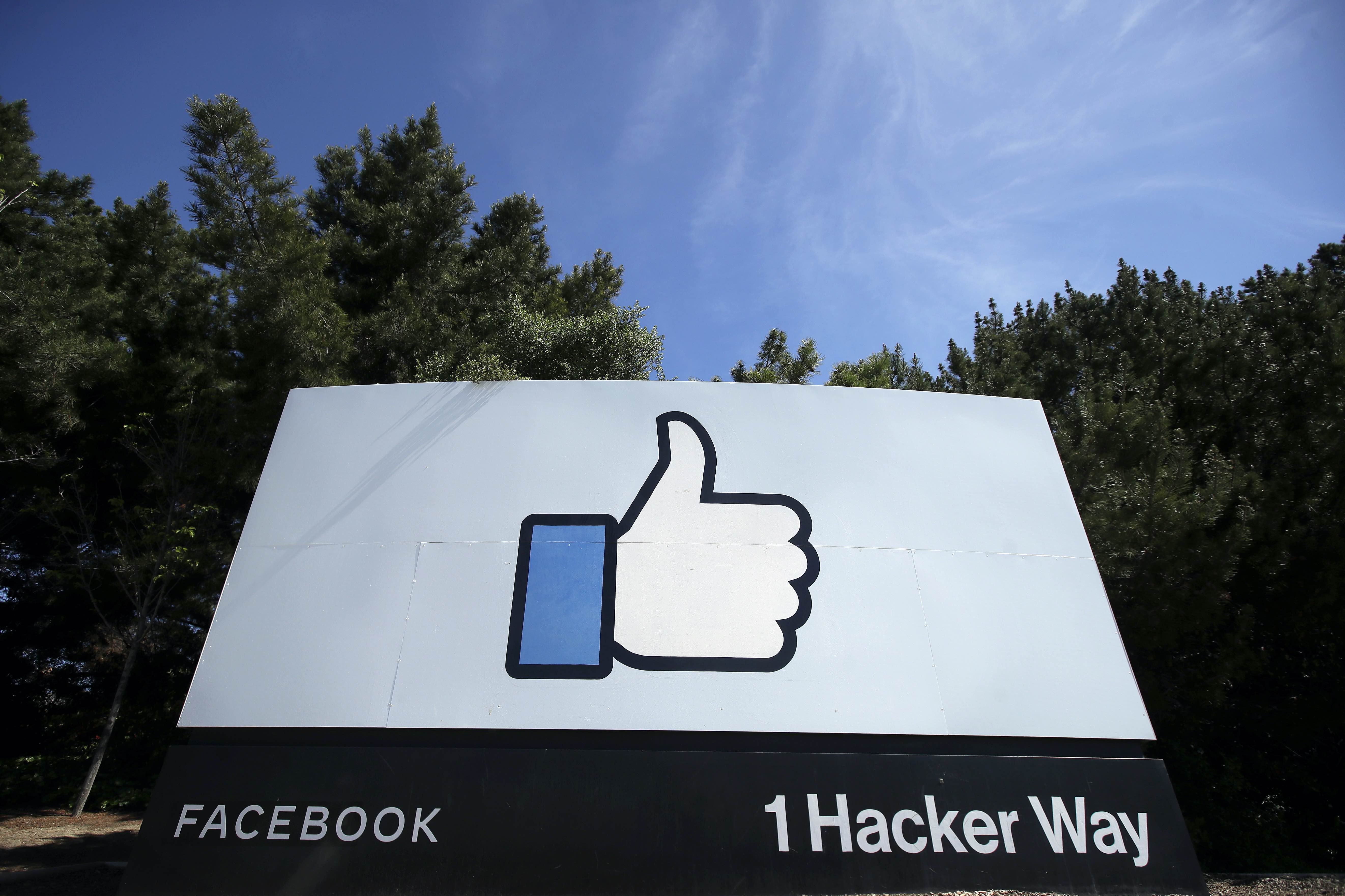 Facebook plans to help build the Metaverse, an enormous virtual world that could be accessed in by millions using avatars to hold virtual meetings, or buy virtual land and clothing or other digital assets, often paying with cryptocurrencies [File: Jeff Chiu/AP Photo]