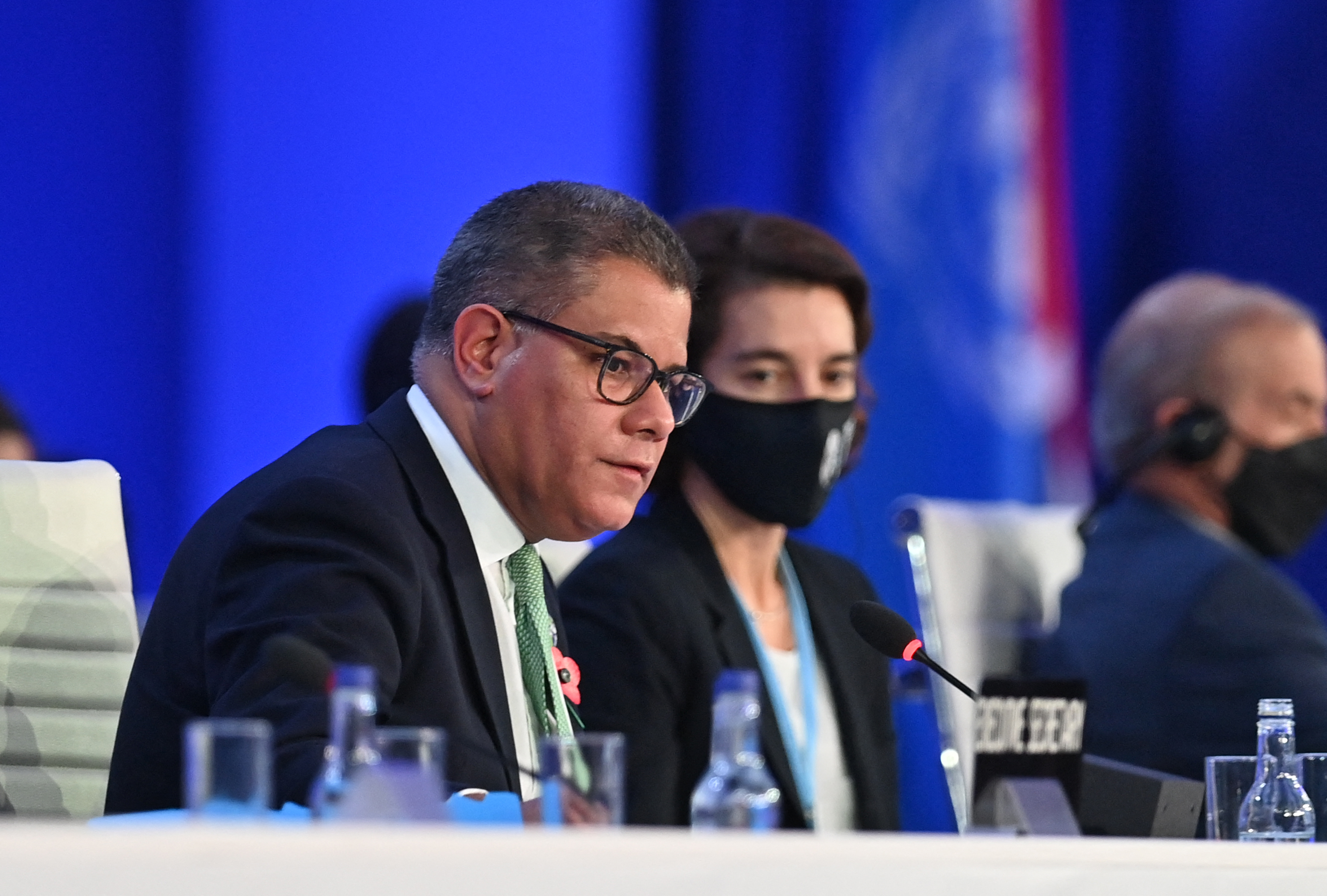 COP26 President Alok Sharma makes his concluding remarks during the climate summit in Glasgow on Saturday [Paul Ellis/AFP]