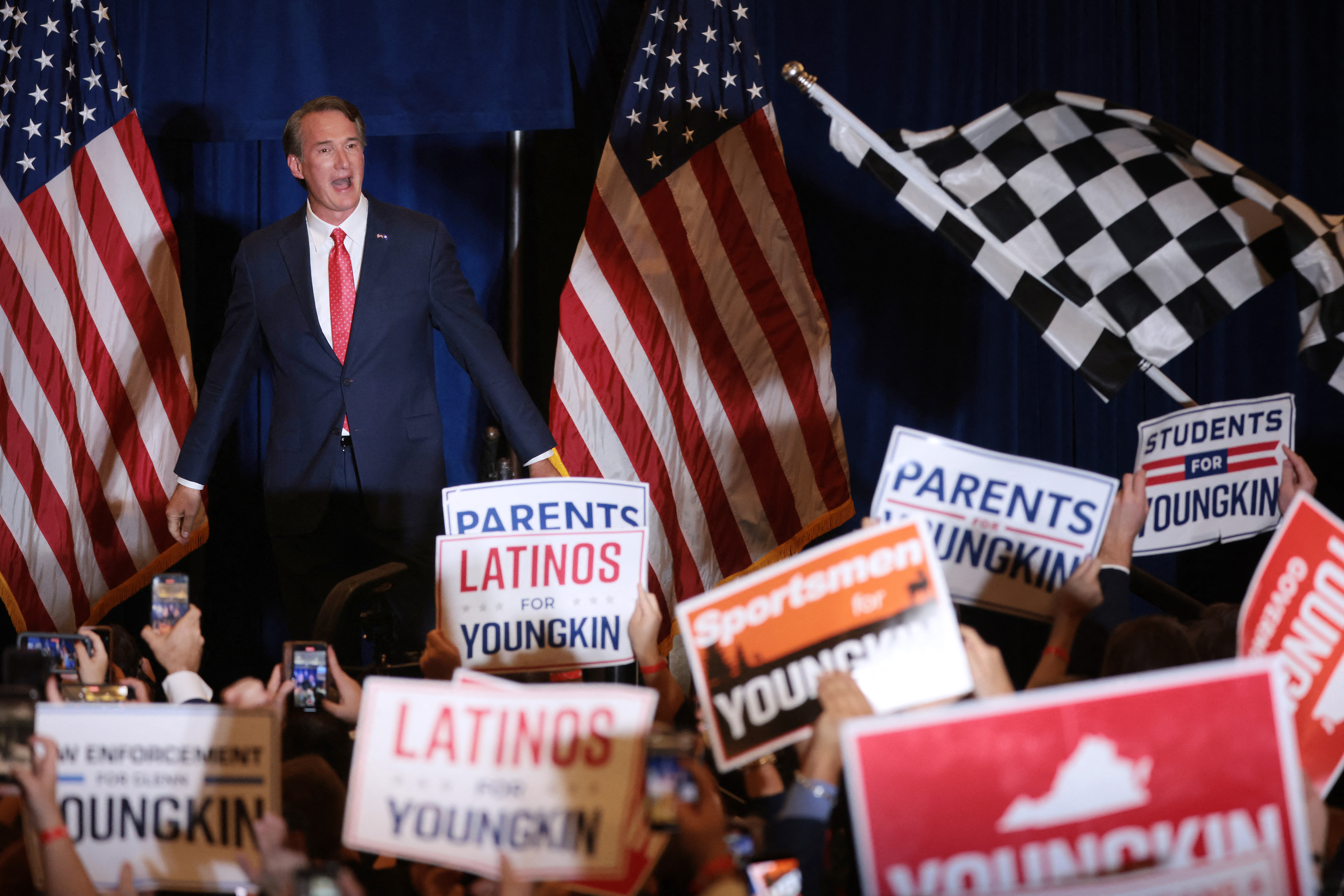 Virginia Republican gubernatorial candidate Glenn Youngkin takes the stage at an election-night rally at the Westfields Marriott Washington Dulles in Chantilly, Virginia. [Chip Somodevilla/Getty Images via AFP]