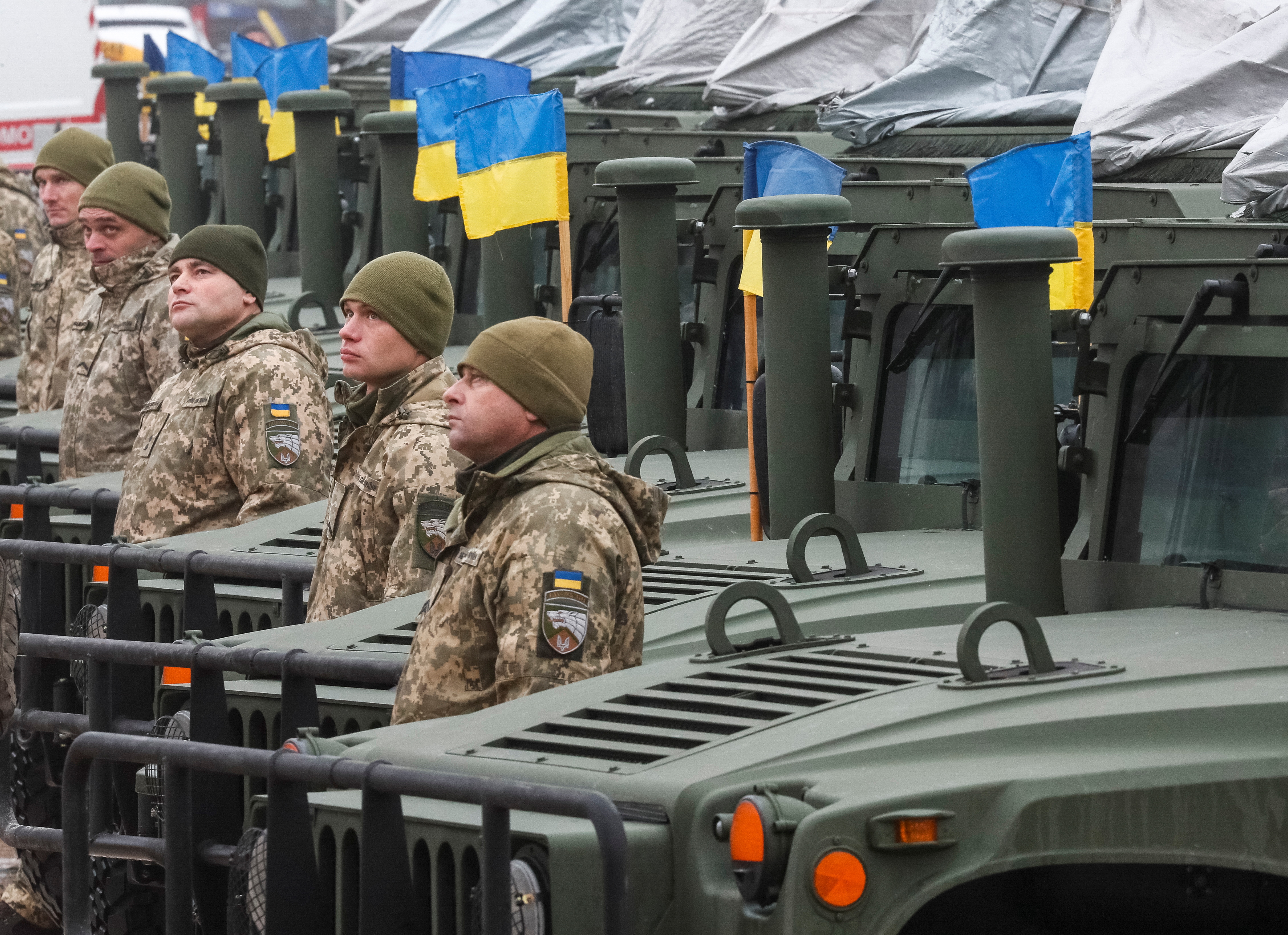 Ukrainian servicemen attend a rehearsal of an official ceremony to hand over tanks and military vehicles to the Ukrainian forces as the country celebrates Army Day in Kyiv on December 6, 2021.