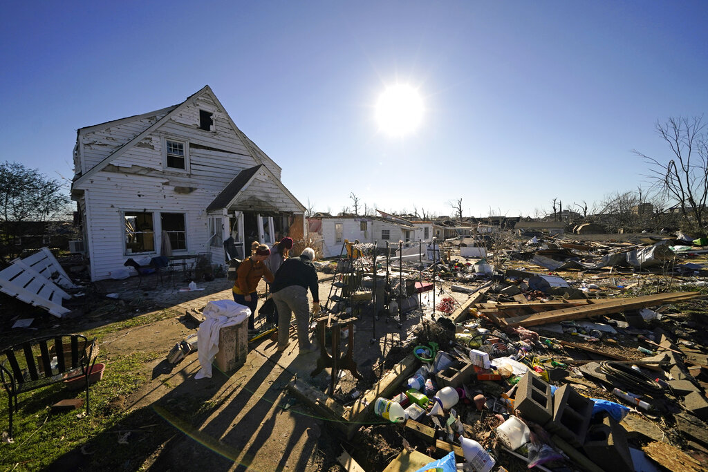 More than 100 people remained missing in Kentucky and more than 1,000 homes were destroyed in the aftermath of tornadoes that tore through Kentucky [File: Gerald Herbert/AP Photo]