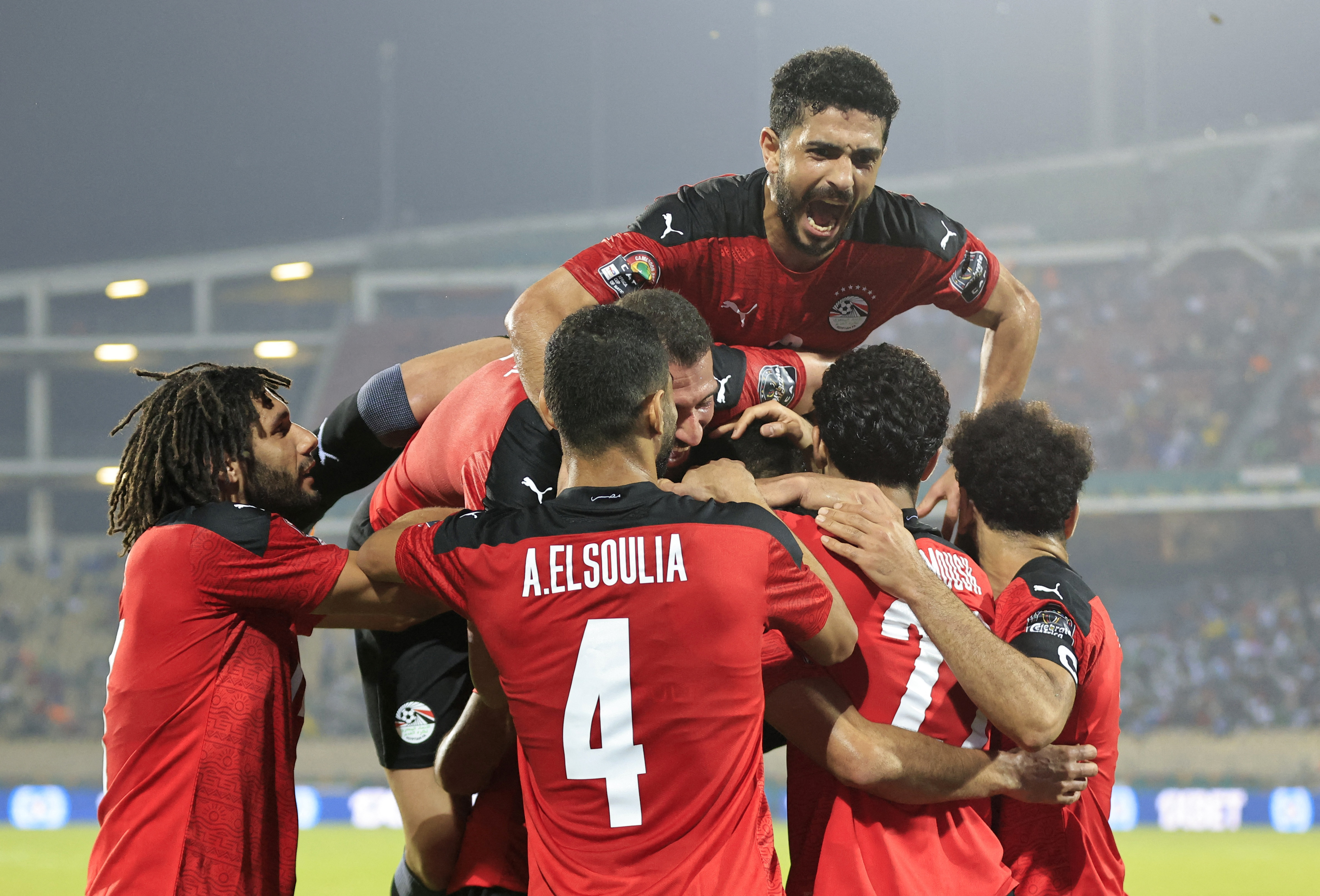January 19, 2022 Egypt's Mohamed Abdelmonem celebrates scoring their first goal with teammates