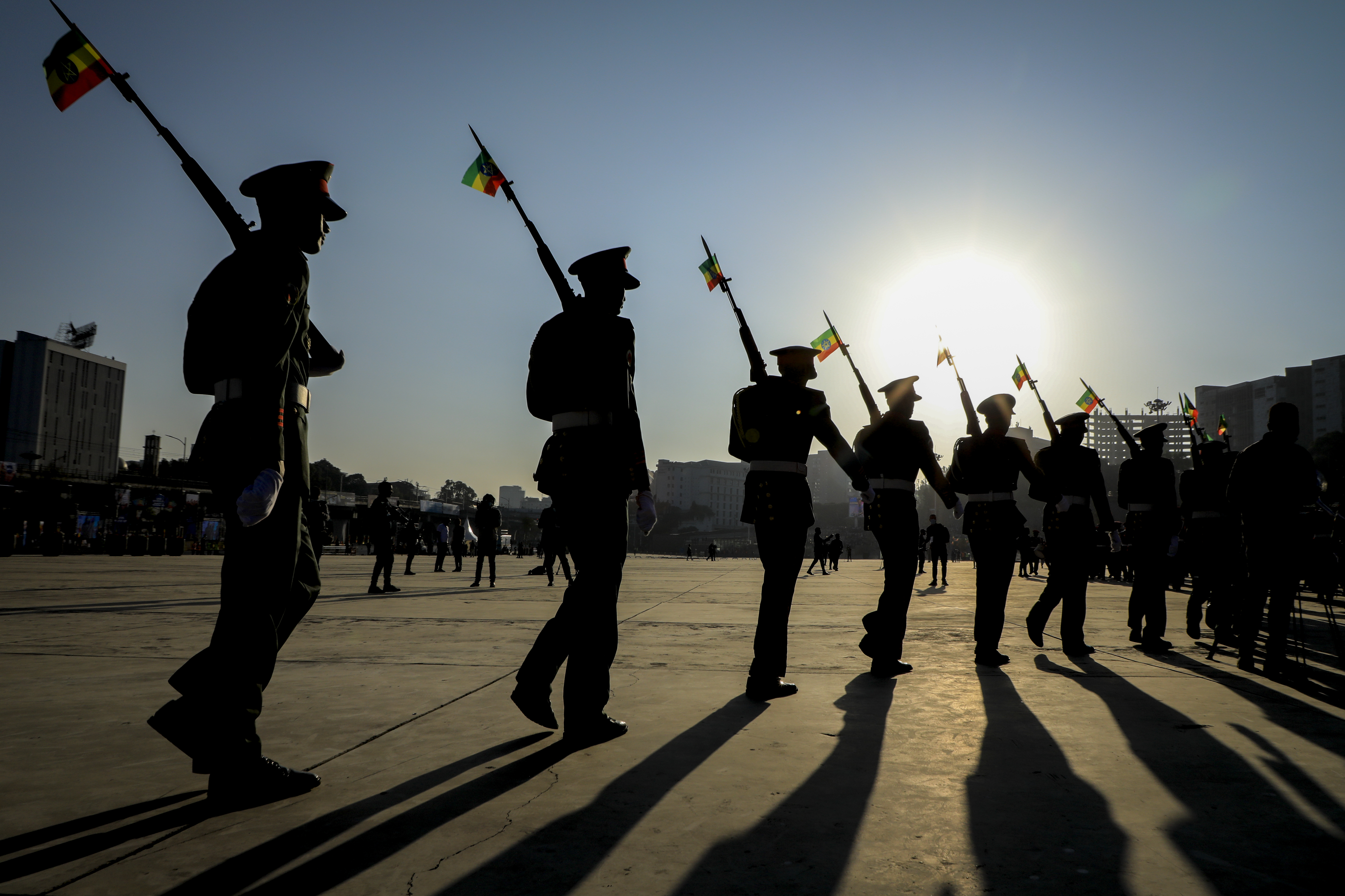 Ethiopian military parade with national flags attached to their rifles in downtown Addis Ababa, Ethiopia