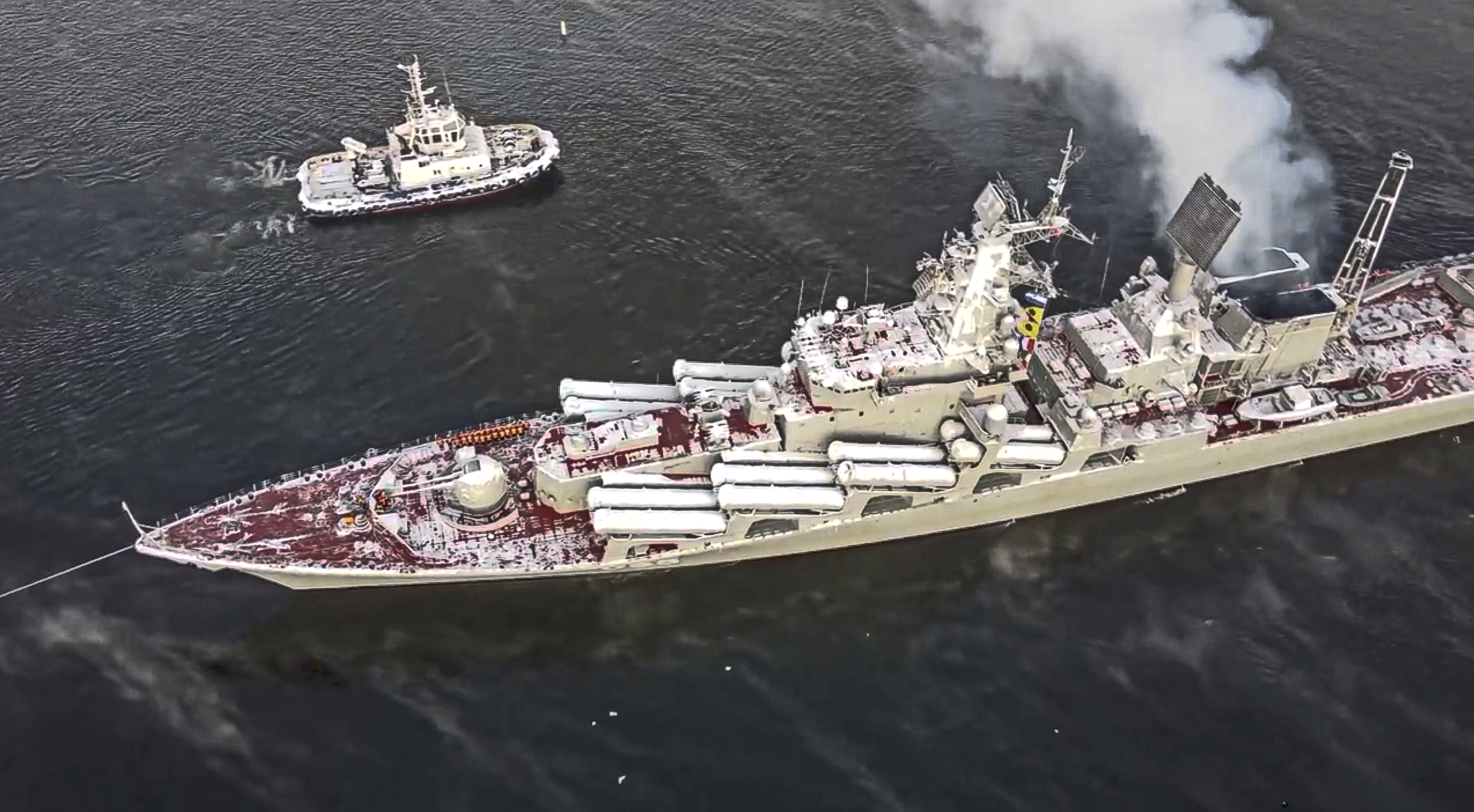 A large ship traveling across water
