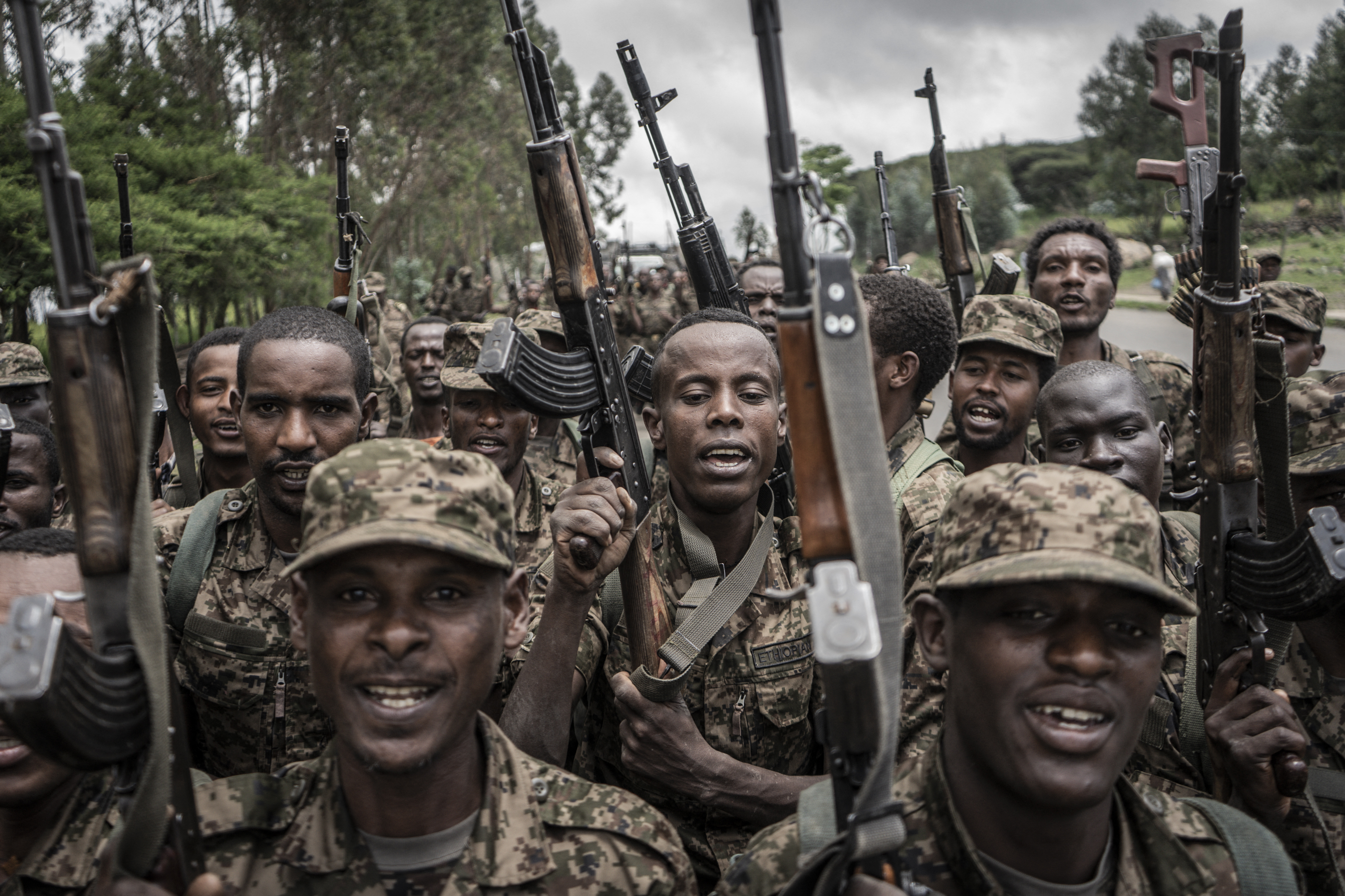 Ethiopian National Defence Forces (ENDF) soldiers shout slogans after finishing their training in the field of Dabat