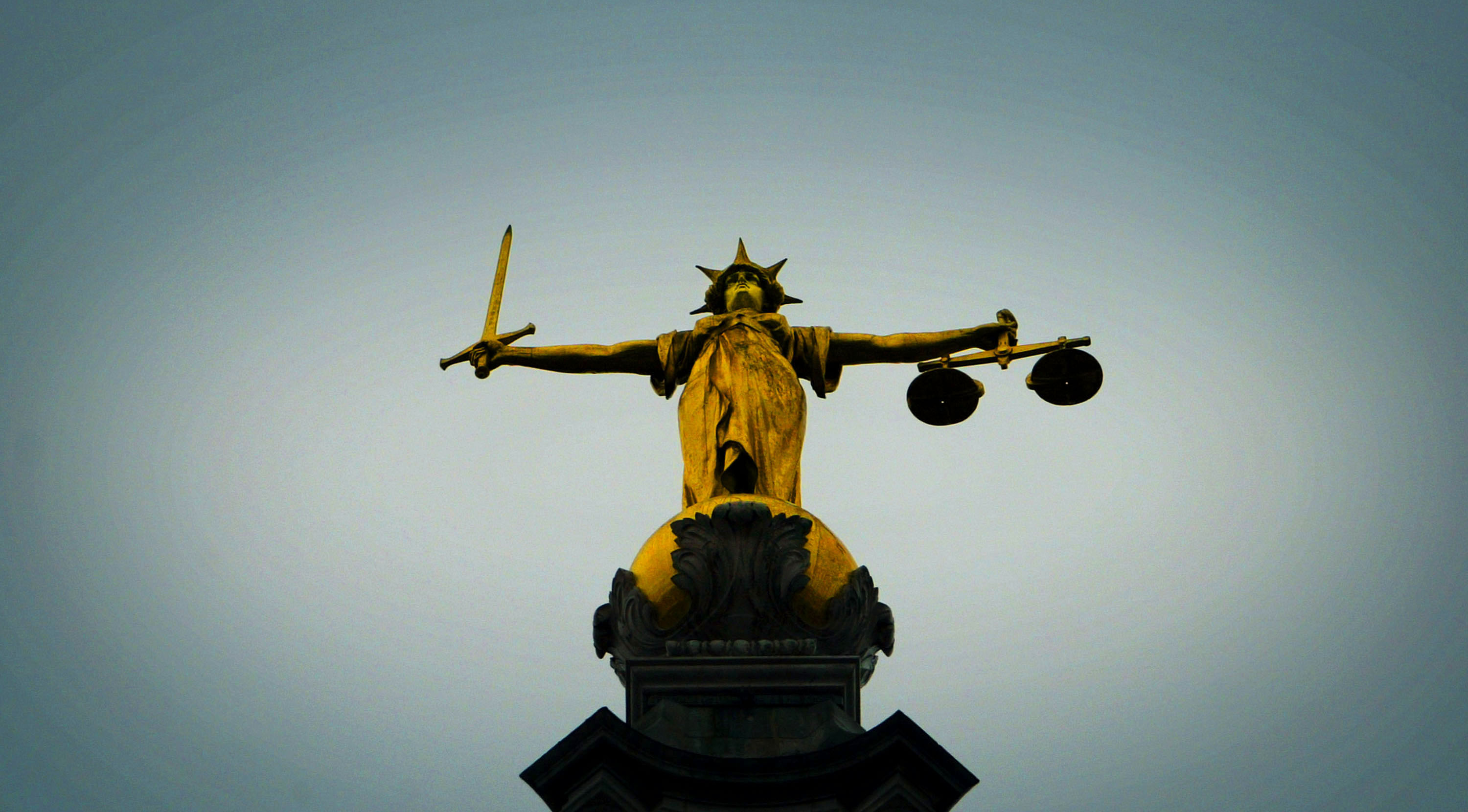 A statue of the scales of justice