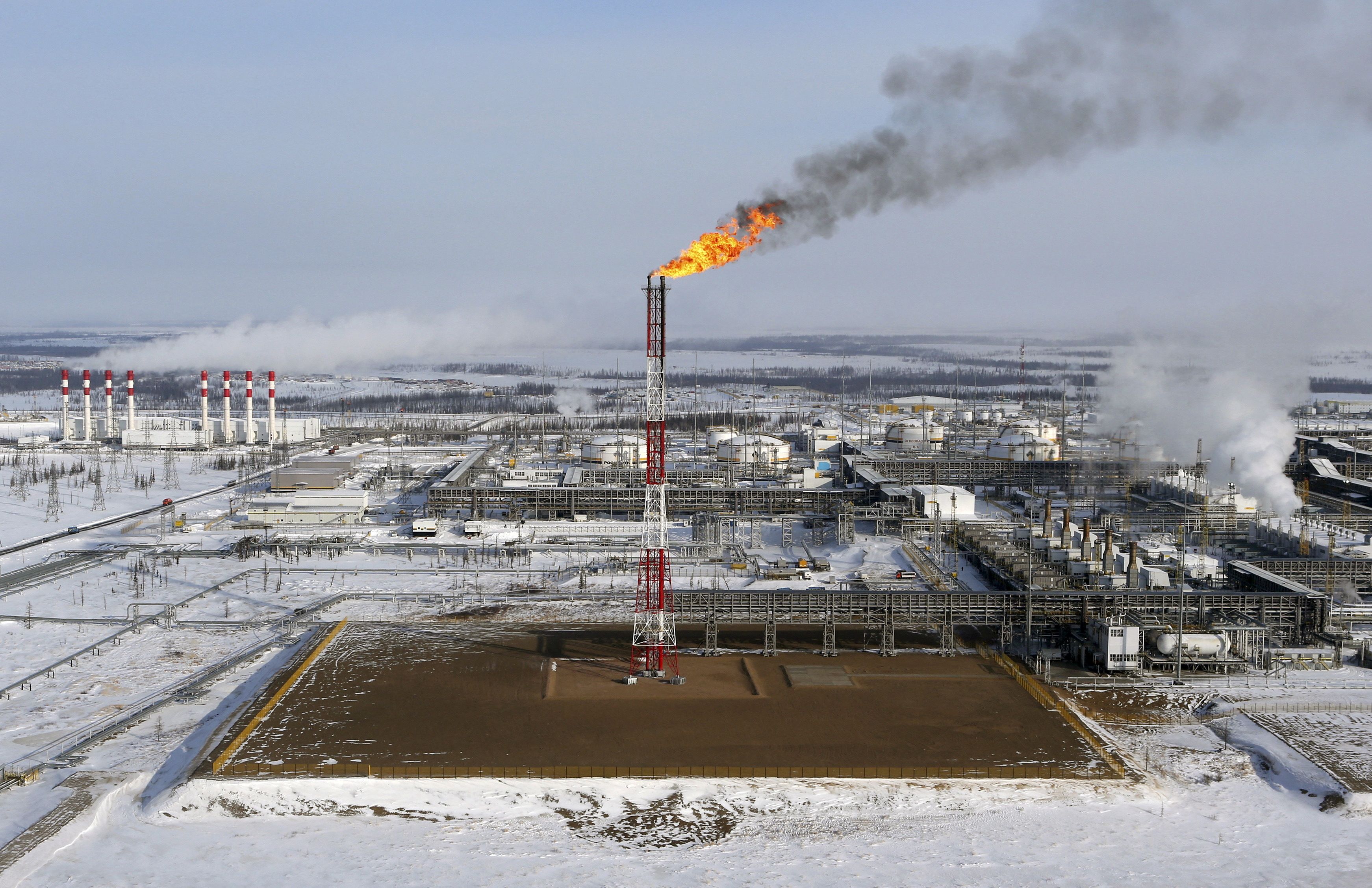 A flame burns from a tower at Vankorskoye oil field in Russia