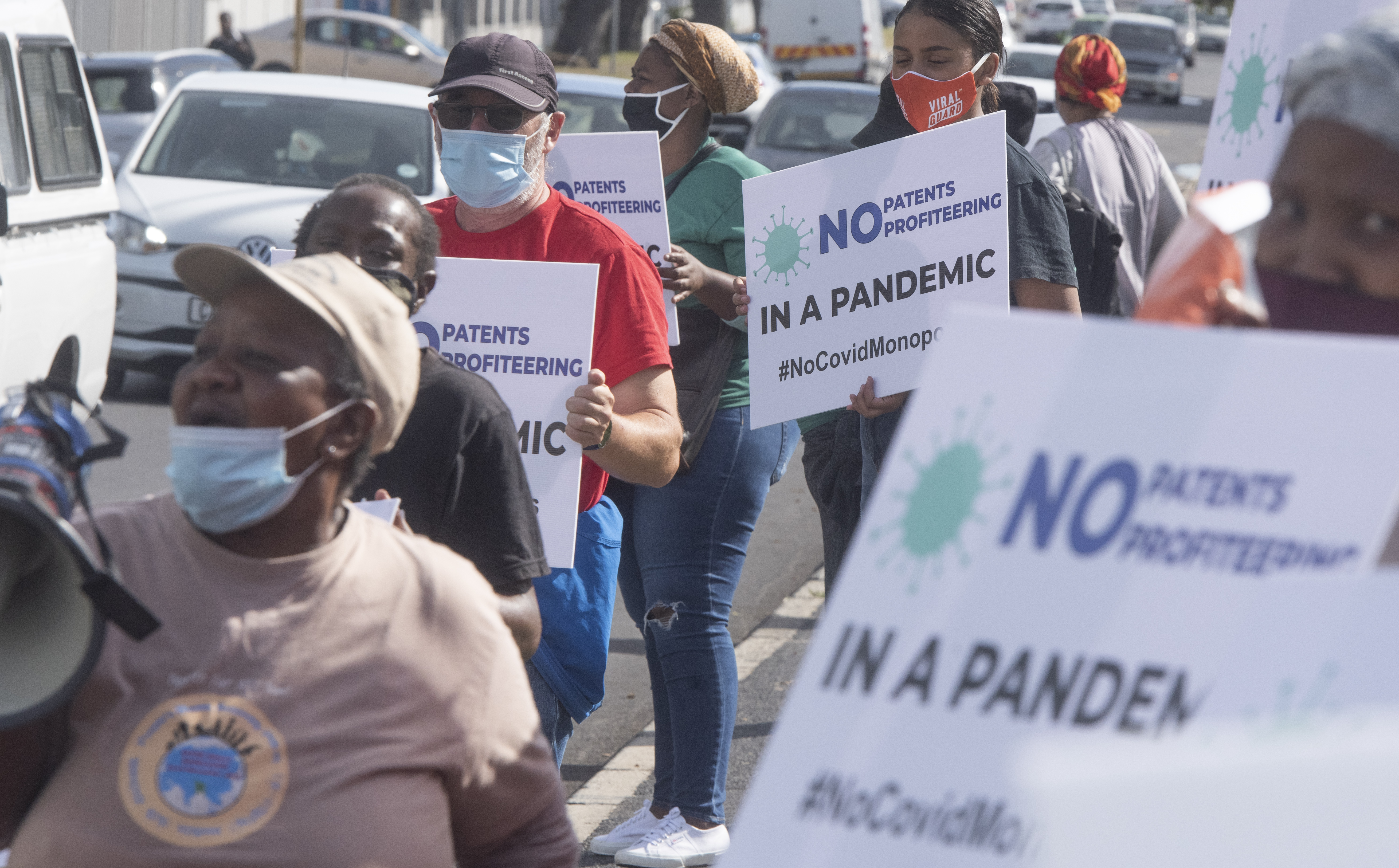 Protesters picket outside Johnson &Johnson Offices