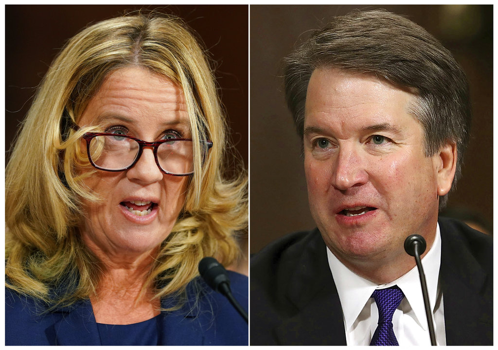 Christine Blasey Ford, left, and U.S. Supreme Court appointee Brett Kavanaugh testify before the Senate Judiciary Committee on Capitol Hill in Washington, Thursday, Sept. 27, 2018.