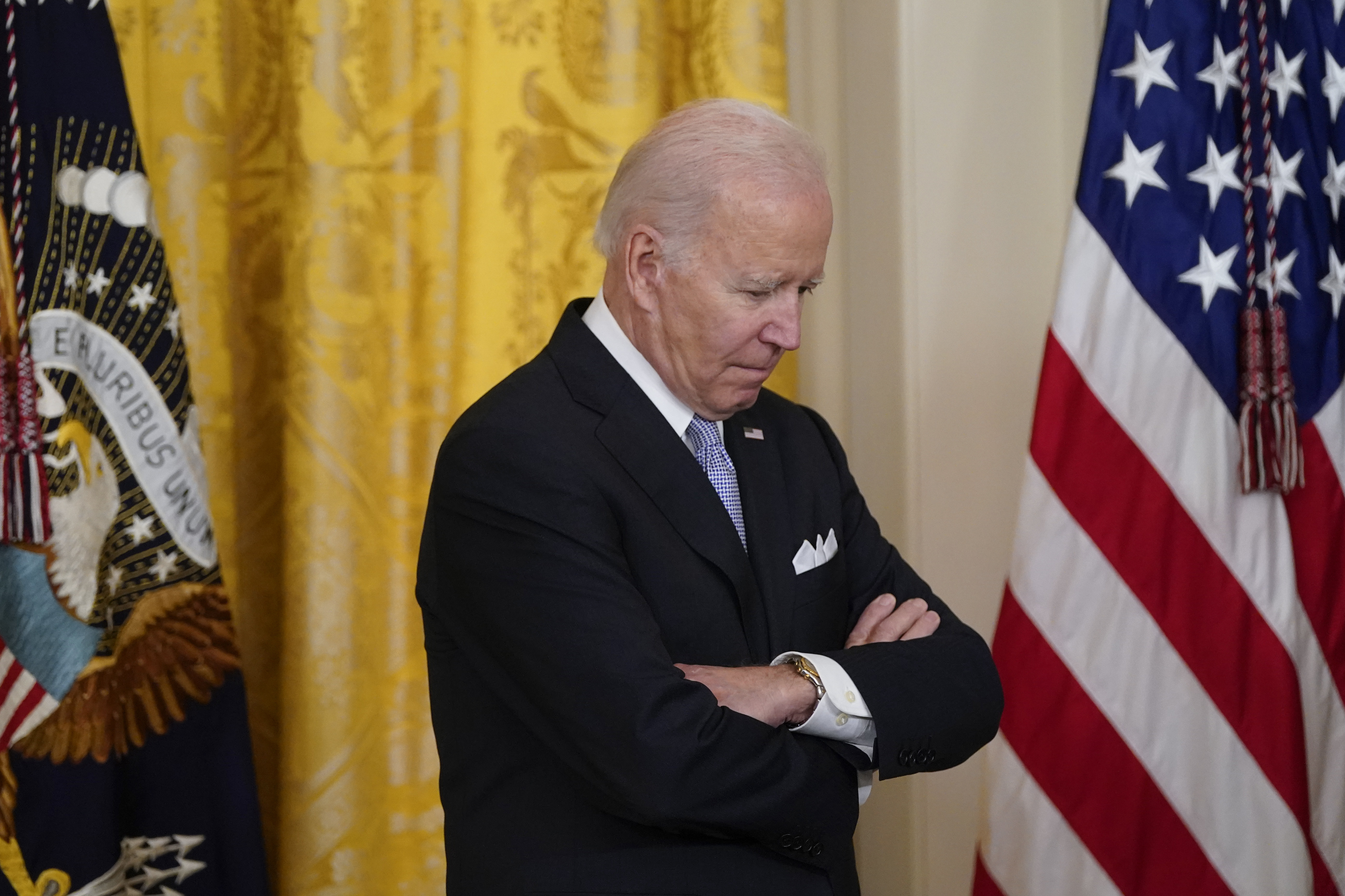 Joe Biden with arms crossed